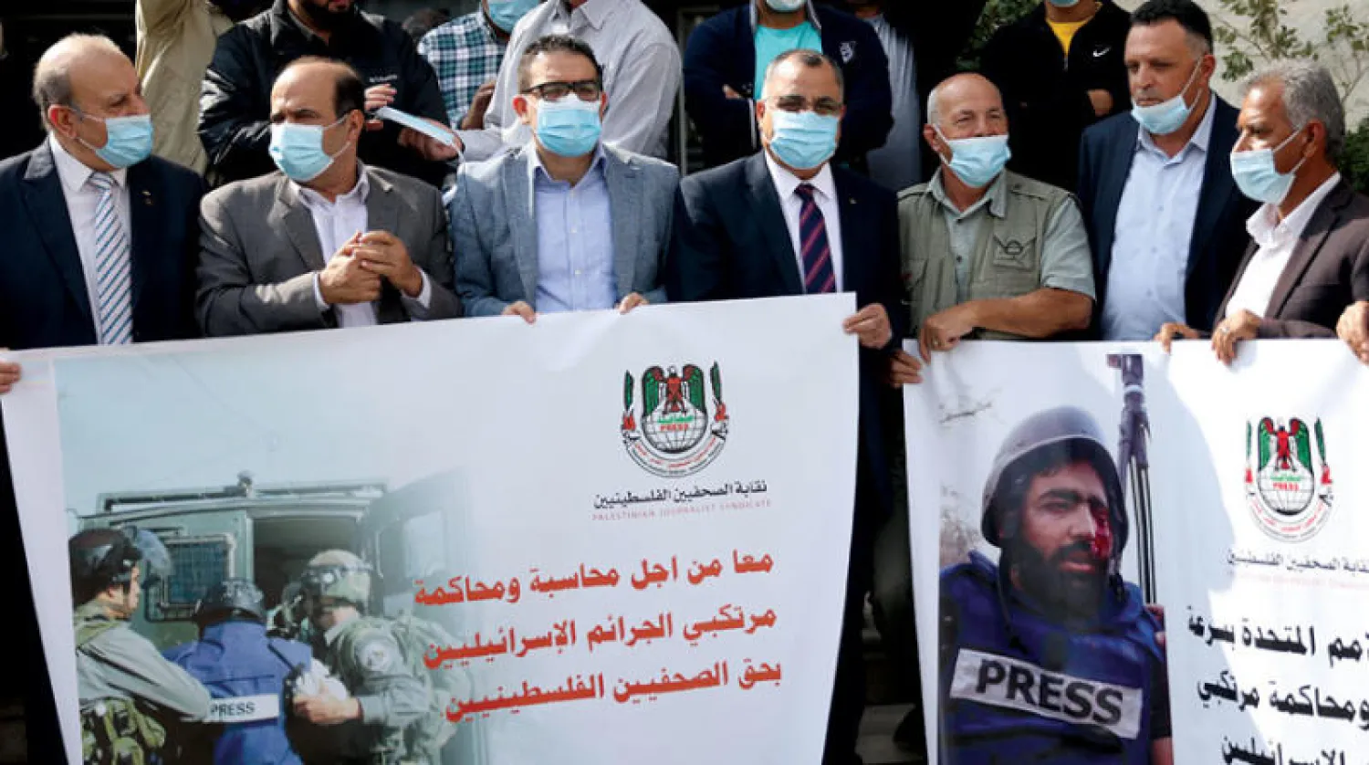 وقفة لنقابة الصحفيين الفلسطينيين أمام هيئة الأمم المتحدة في رام الله (وفا)