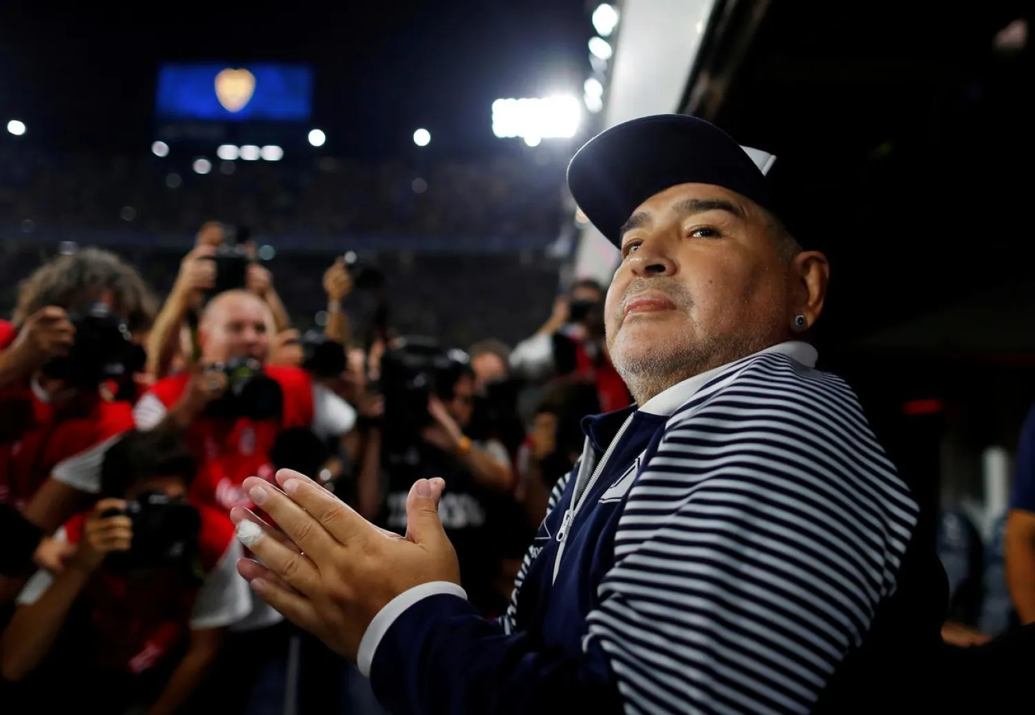 FILE PHOTO: Soccer Football - Superliga - Boca Juniors v Gimnasia y Esgrima - Alberto J. Armando Stadium, Buenos Aires, Argentina - March 7, 2020 Gimnasia y Esgrima coach Diego Maradona before the match REUTERS/Agustin Marcarian