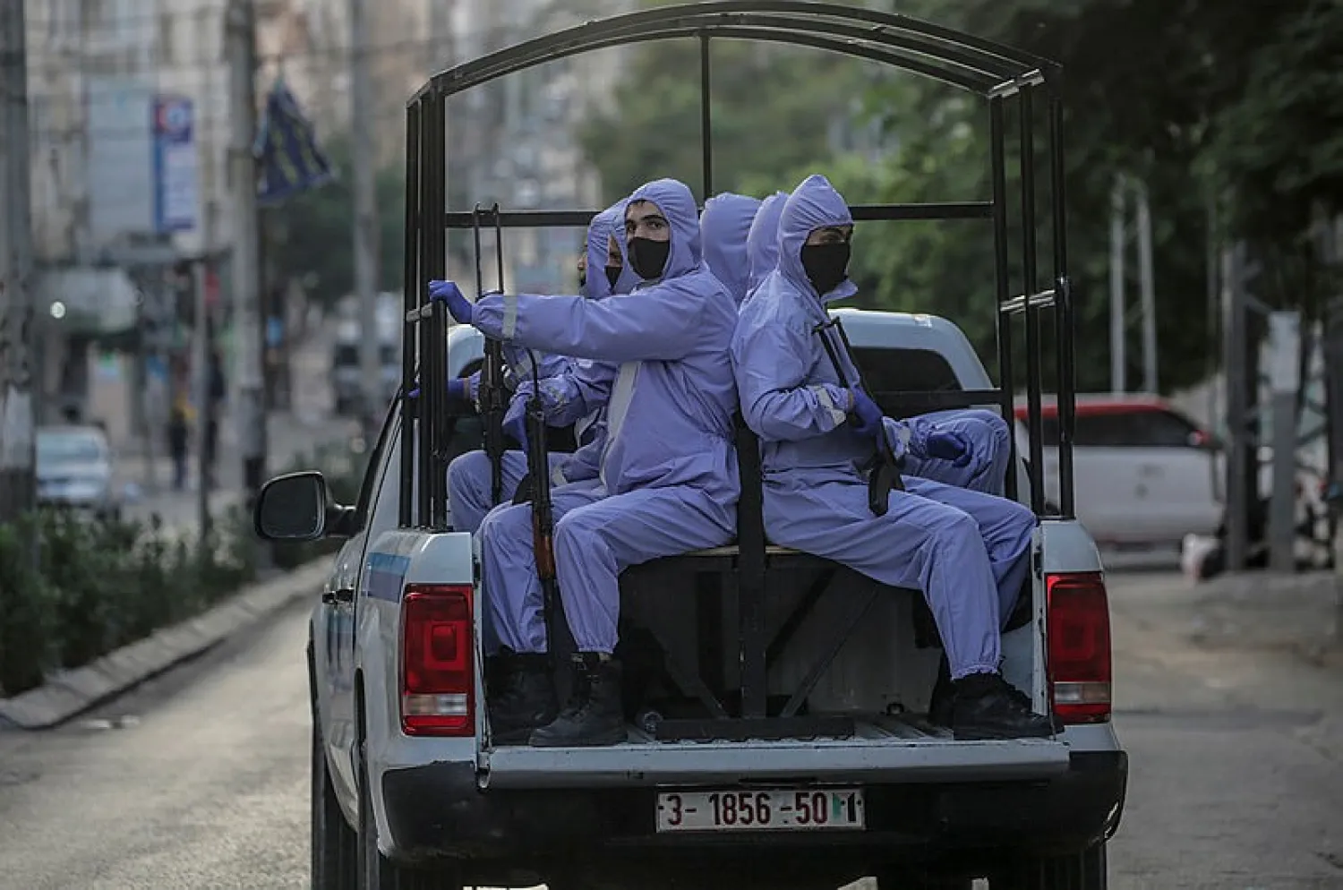 Hamas security personnel in protective gear patrol the streets of Gaza amid the coronavirus pandemic. EPA