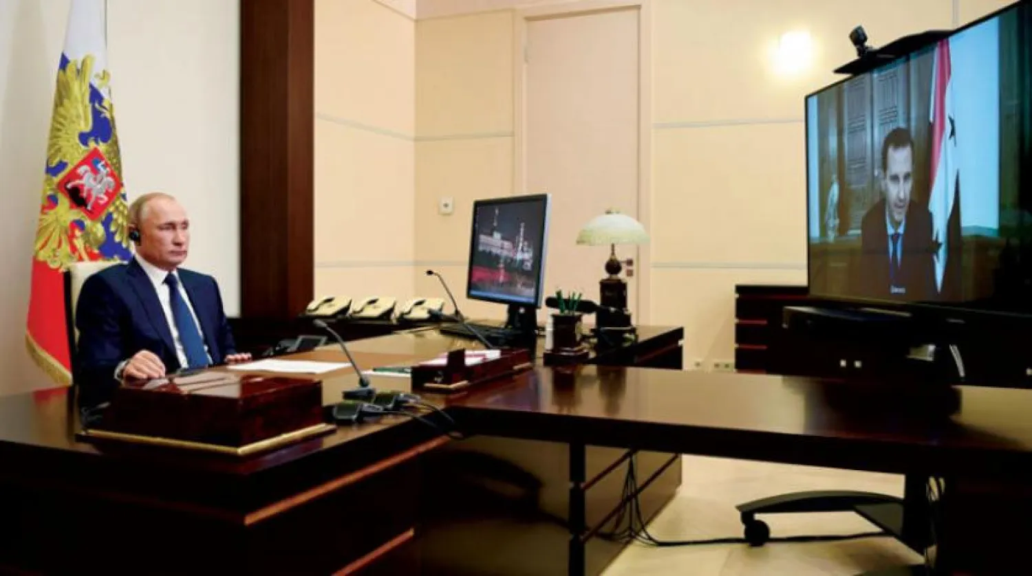 Putin dün Esed ile görüntülü bir görüşme gerçekleştirdi. (AFP)