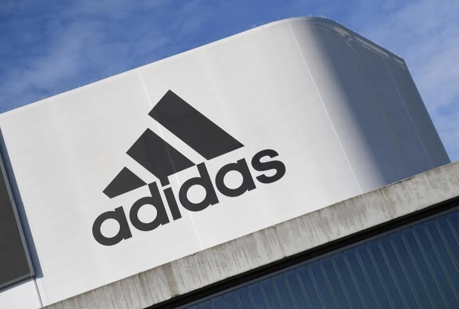 The Adidas logo at the company's headquarters in Herzogenaurach, Germany, August 9, 2019. REUTERS/Andreas Gebert