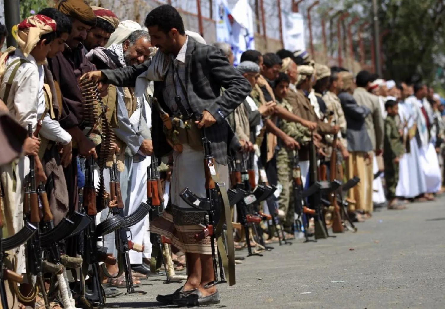 Houthi fighters parade with their weapons in Sanaa (AFP/file photo)