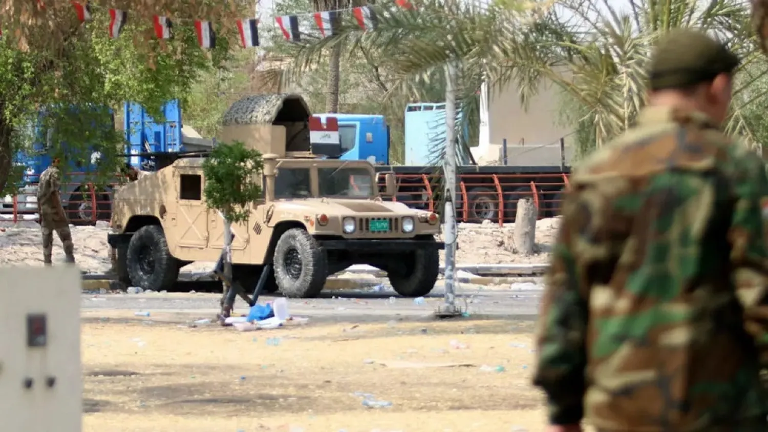 Iraqi security forces are deployed in a street in the southern city of Basra on September 5, 2018. (AFP)