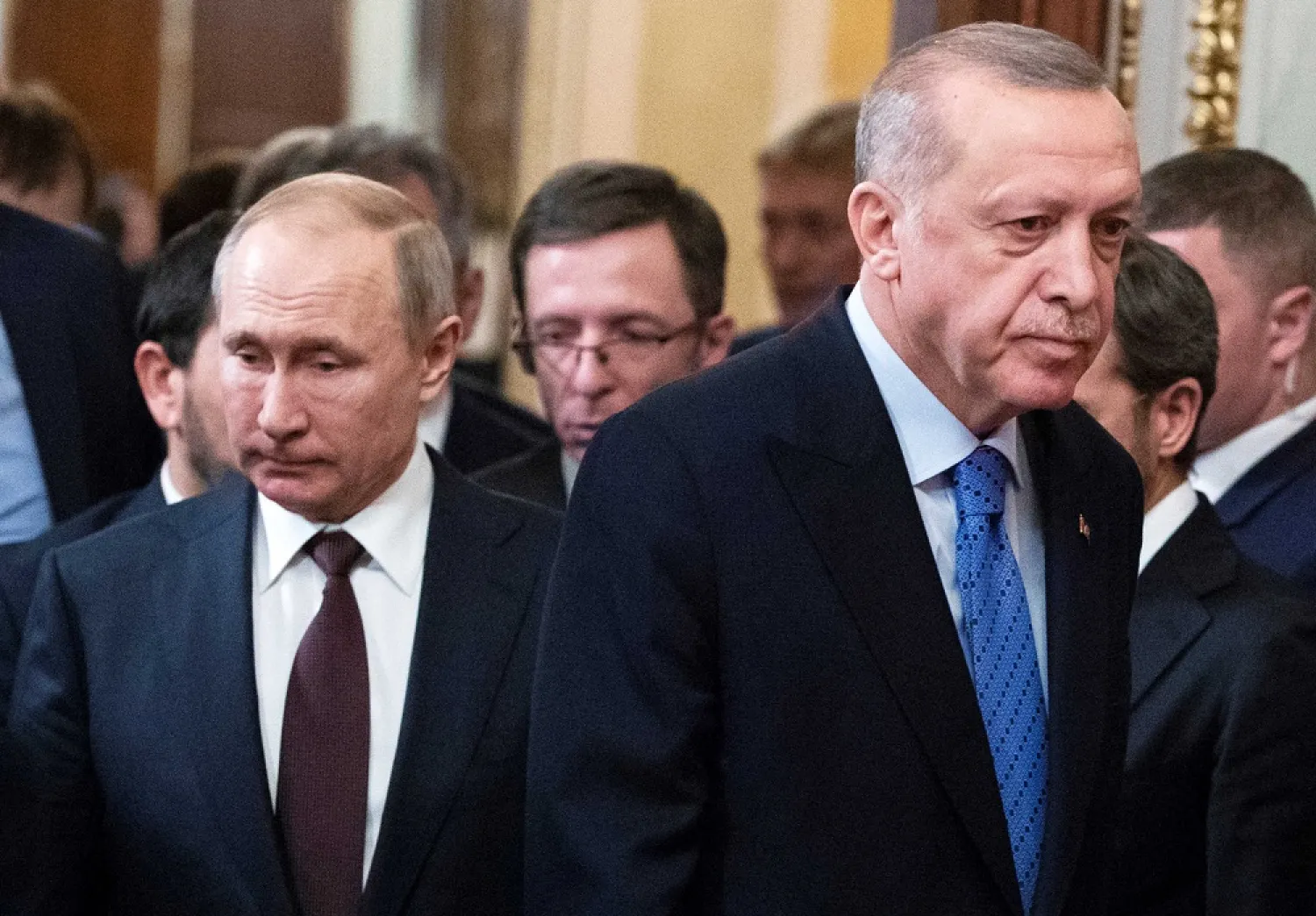 Russian President Vladimir Putin and Turkish President Recep Tayyip Erdogan arrive for a news conference following their talks in Moscow, Russia March 5, 2020. (Reuters)
