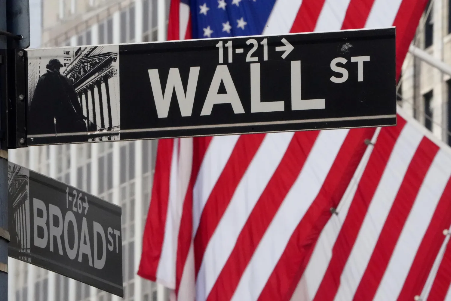 The Wall Street sign is pictured at the New York Stock exchange
(NYSE) in the Manhattan borough of New York City, New York, US, March
9, 2020. REUTERS/Carlo Allegri/File Photo