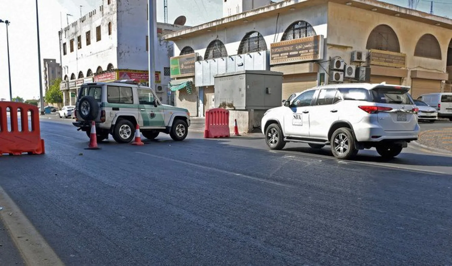Saudi police close a street leading to a non-Muslim cemetery in Jeddah where a blast took place on Nov. 11, 2020. (AFP)

