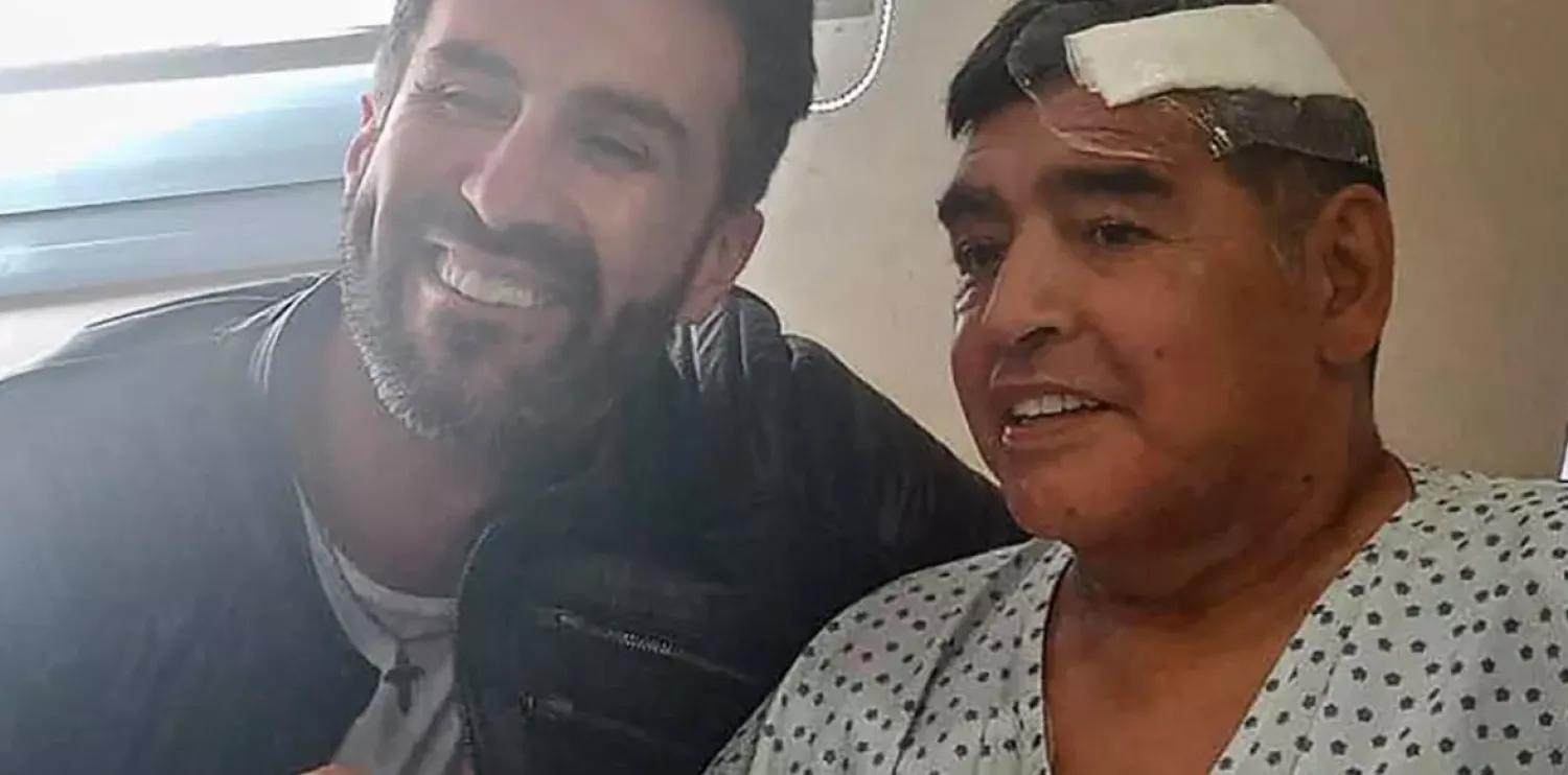 Argentine football legend Diego Maradona (R) and his doctor Leopoldo Luque are pictured in Olivos, Argentina on November 11, 2020. Diego Maradona press office/AFP