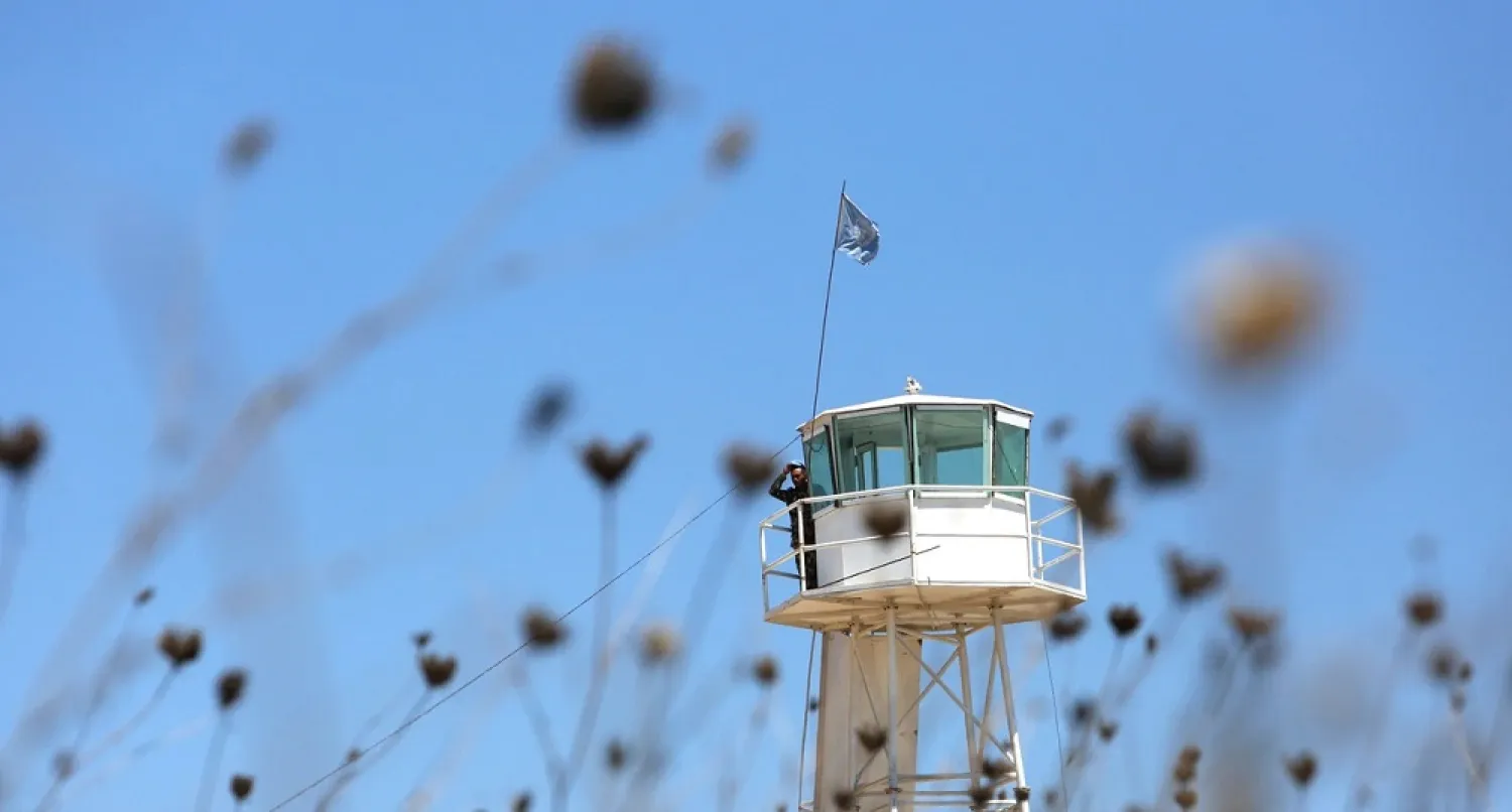 A UN peacekeeper of the United Nations Interim Force in Lebanon stands on United Nation's post in Houla village near the Lebanese-Israeli border, in southern Lebanon, Aug. 26, 2020. (Reuters)