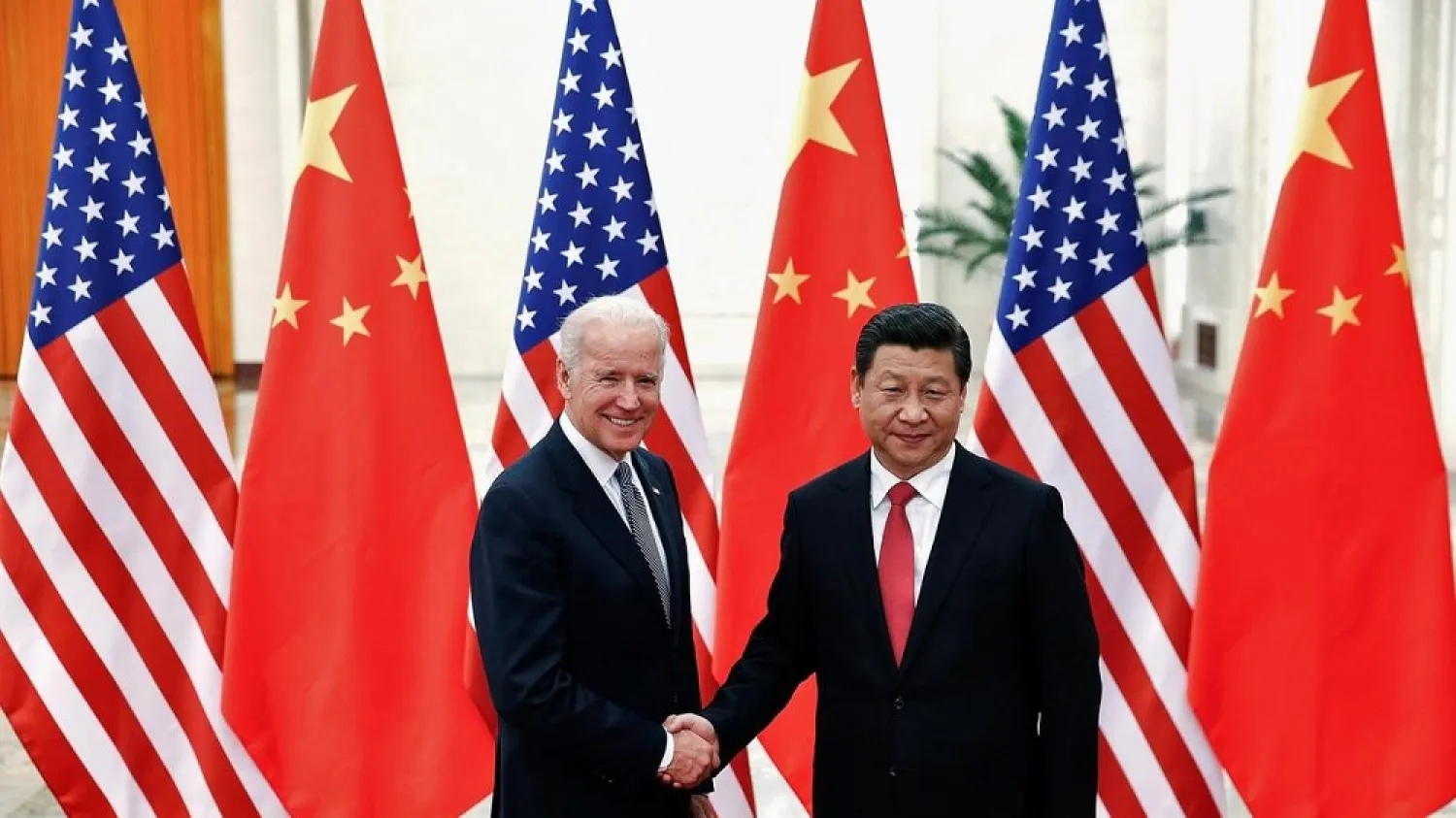 Chinese President Xi Jinping shakes hands with then US Vice President Joe Biden in 2013. (Reuters)