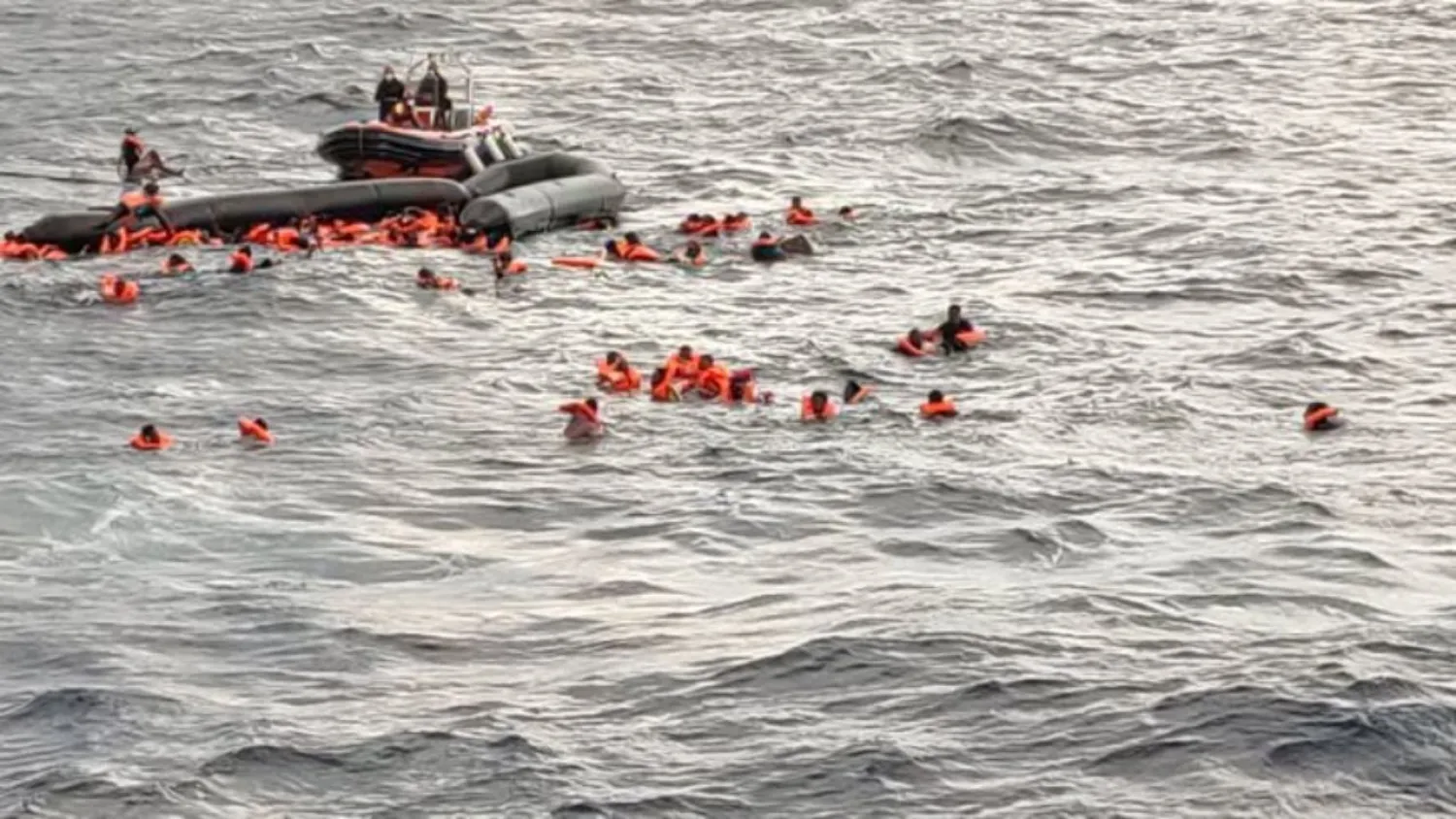Migrants at sea waiting to be rescued in the Mediterranean Sea