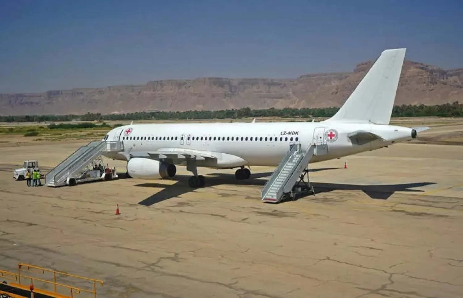 A Red Cross plane sits on the tarmac in Seiyun city to ferry home prisoners as part of sway between the government and Houthis in October. (AFP)