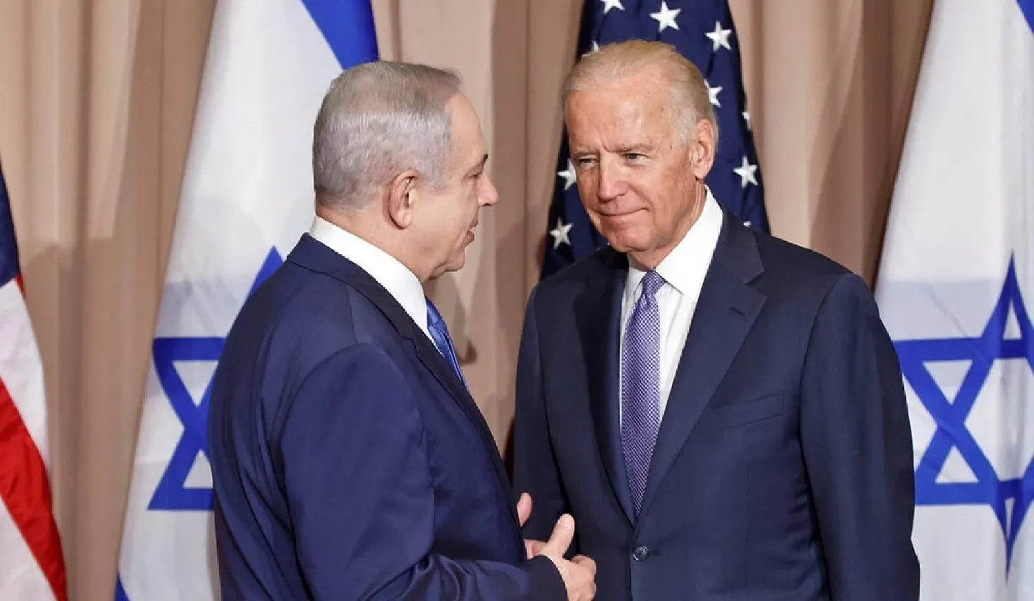 Israeli Prime Minister Benjamin Netanyahu and then US Vice-President Joe Biden prior to a meeting on the sidelines of the World Economic Forum in Davos, January 21, 2016. (AP)