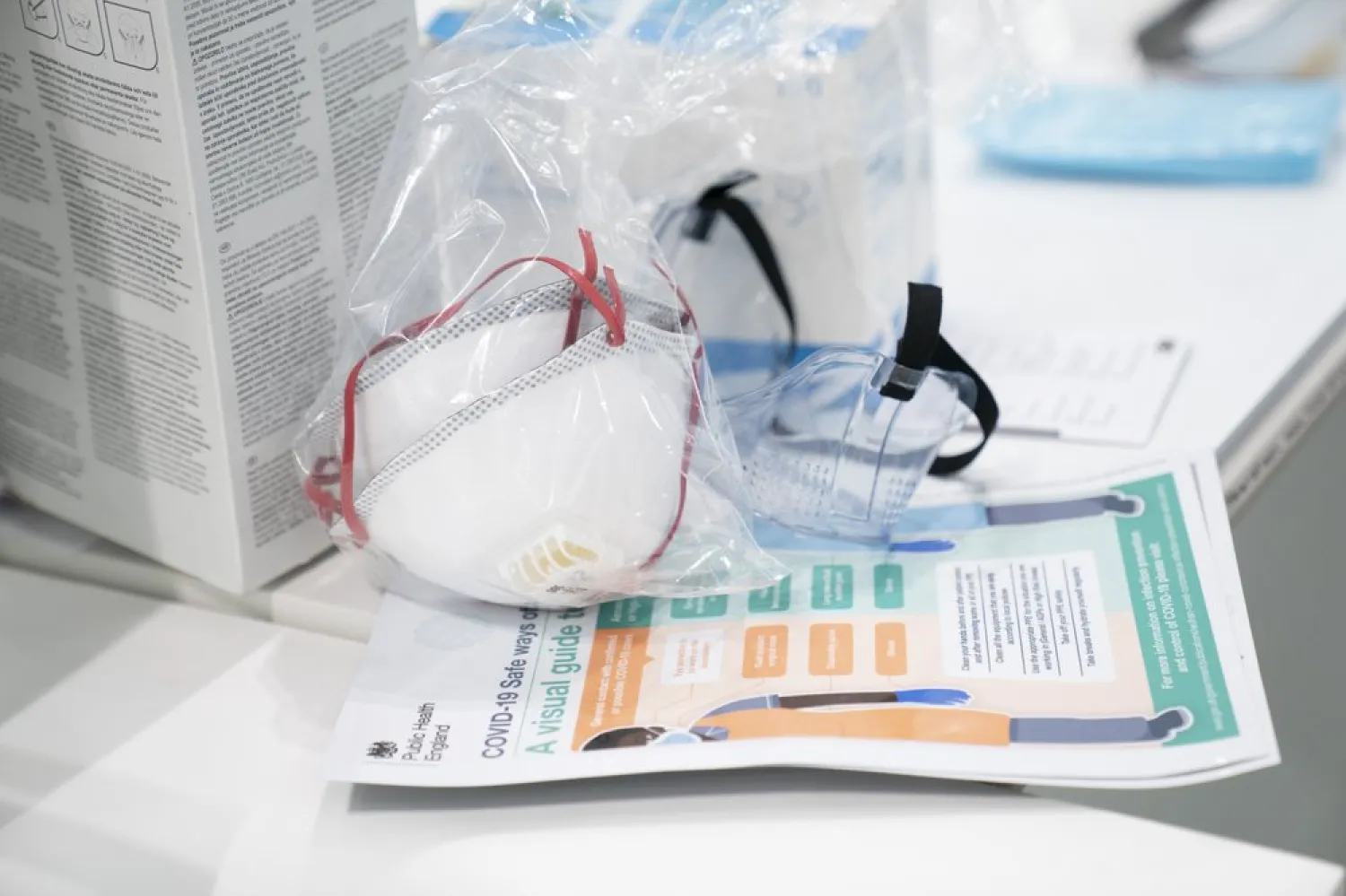 FILE - In this Thursday, April 16, 2020 file photo, a view of masks and goggles, part of PPE, personal protective equipment, to avoid being infected or transmitting coronavirus, at the Nightingale Hospital North West set up in the Manchester Central Convention Complex in Manchester, northern England.(AP Photo/Jon Super, File)
