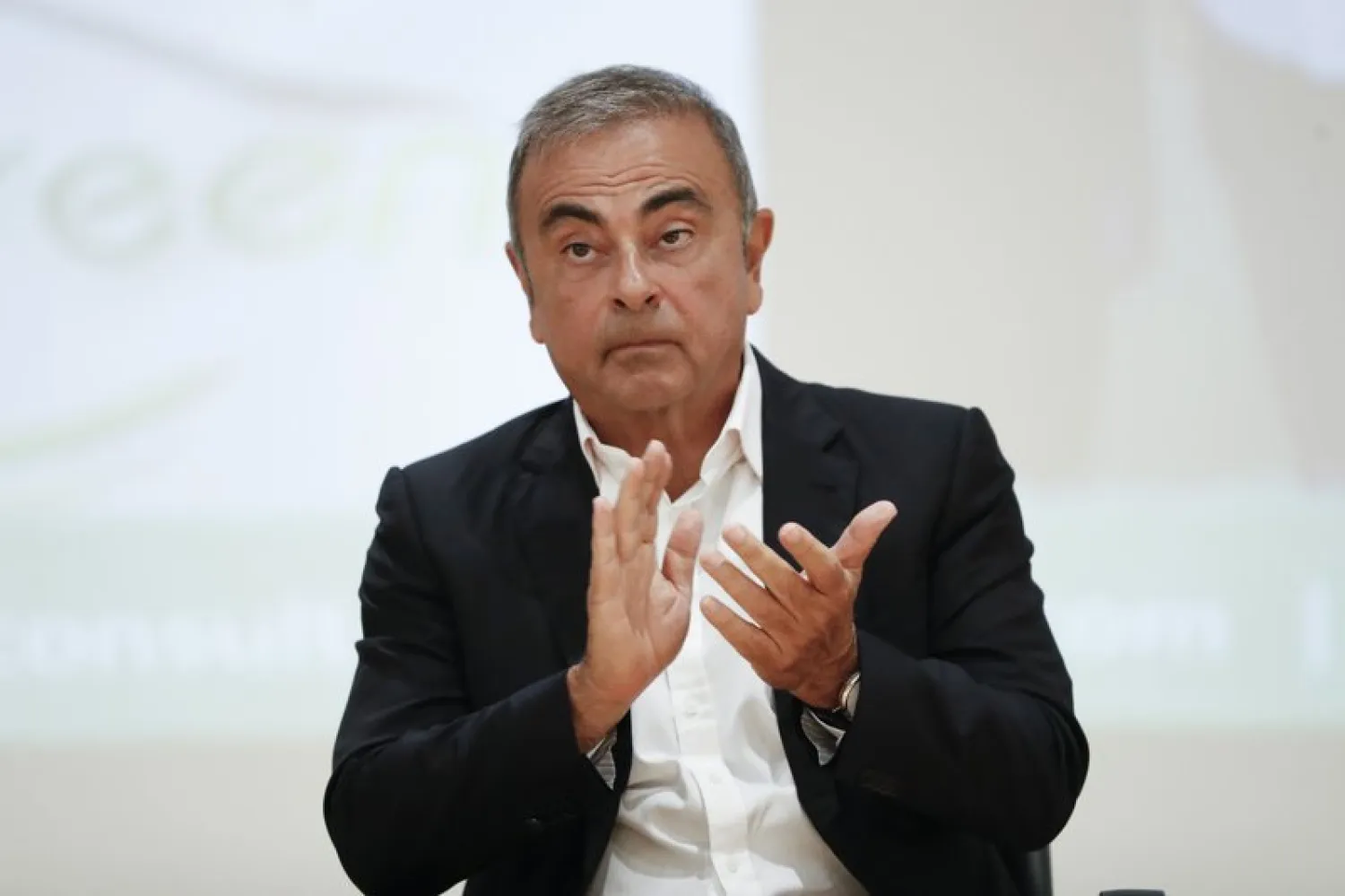 FILE - In this Sept. 29, 2020, file photo, Nissan's former executive Carlos Ghosn attends a press conference at the Holy Spirit University of Kaslik (USEK), north of Beirut, Lebanon. (AP Photo/Hussein Malla, File)
