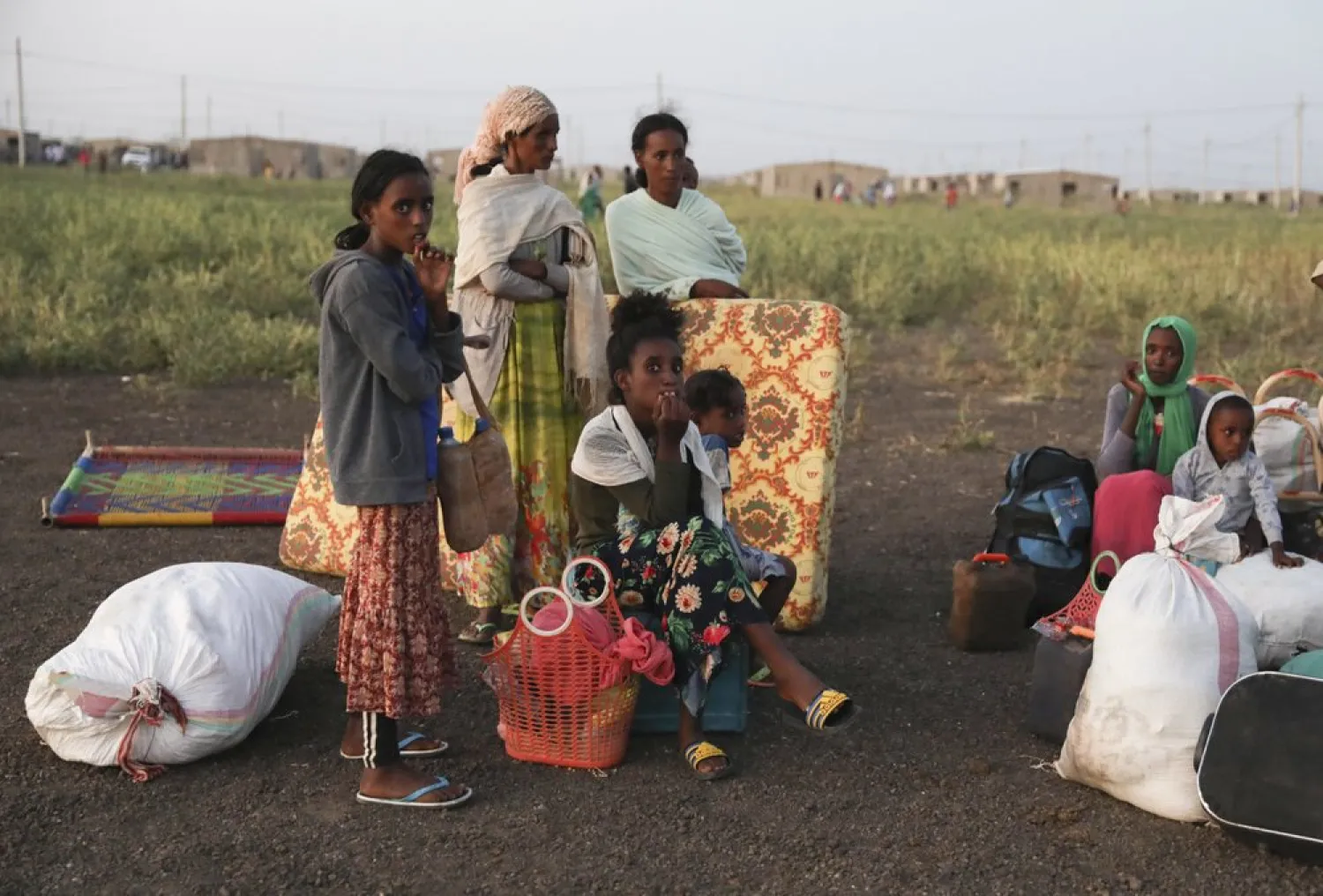 Ethiopian refugees gather in Qadarif region, eastern Sudan, Sunday, Nov. 15, 2020. (AP)