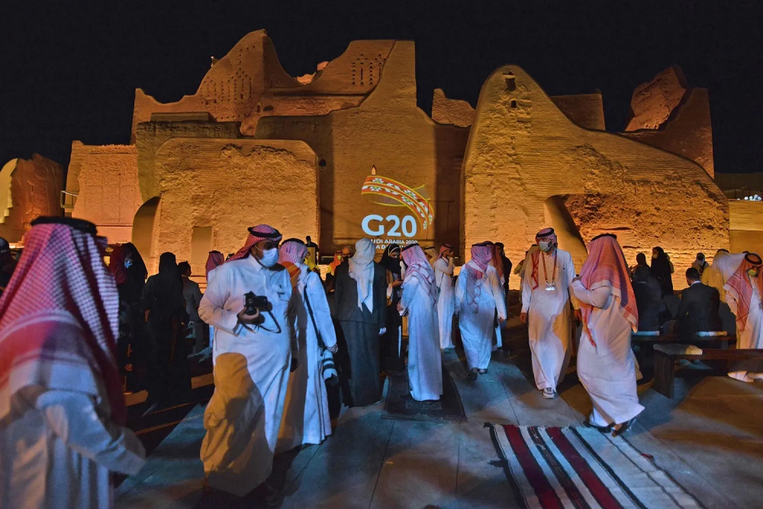 The G20 logo is projected at the historic site of al-Tarif in Diriyah district, on the outskirts of Saudi capital Riyadh, on Nov. 20, 2020. (Getty Images)