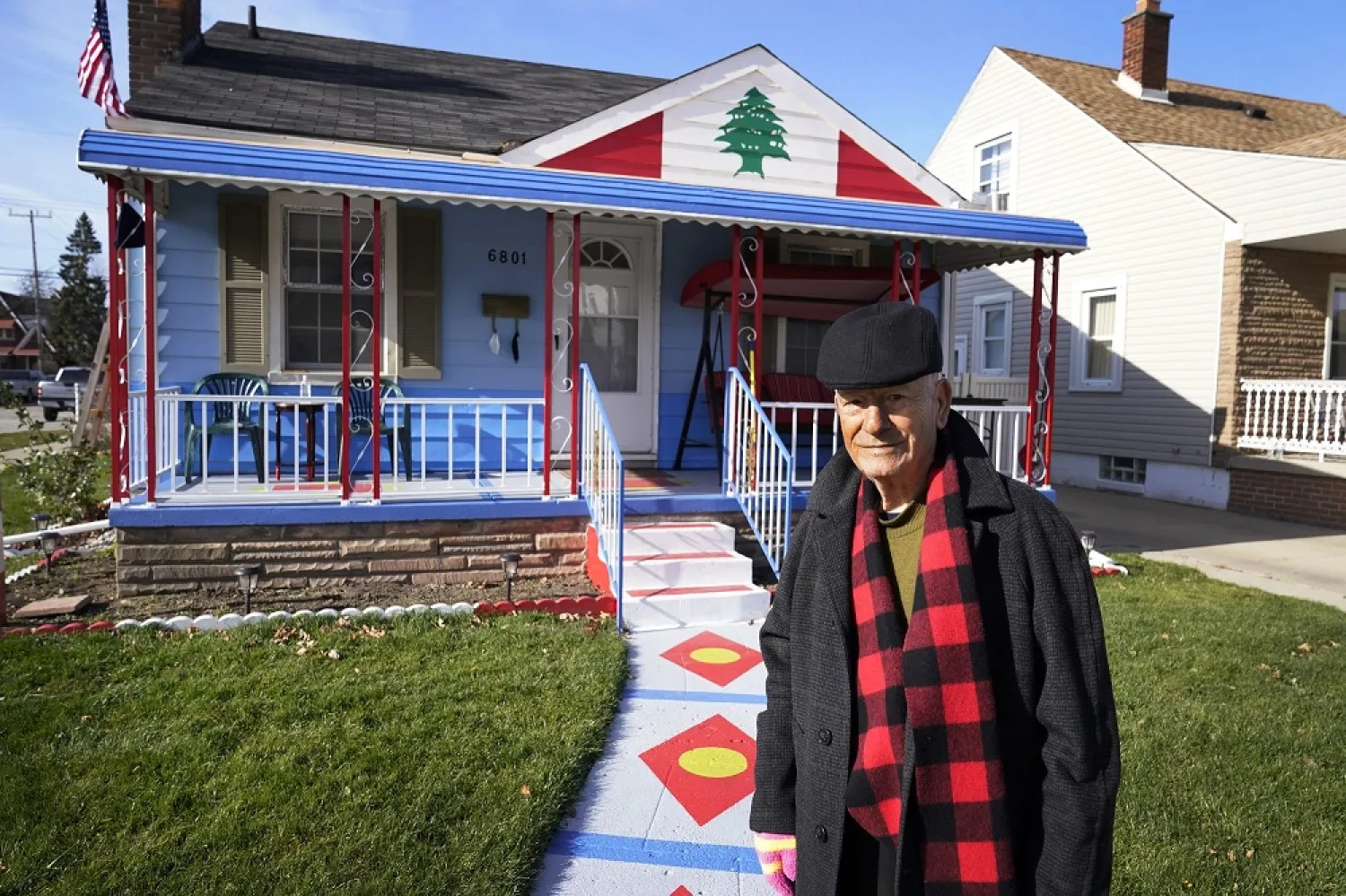 Samih Zreik stands in front of his house, Thursday, Nov. 19, 2020, in Dearborn, Mich. (AP)