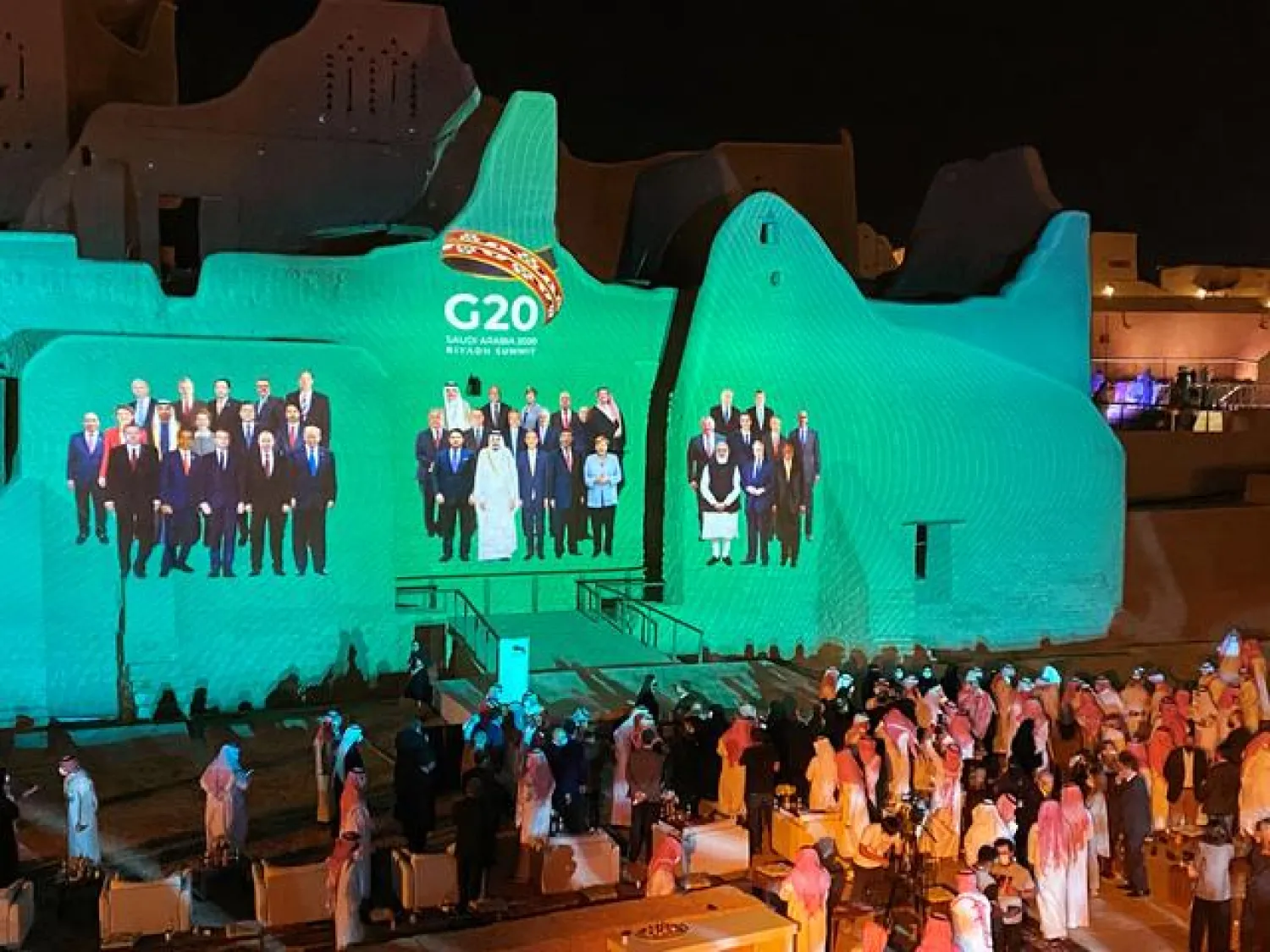 Family Photo for the annual G20 Summit World Leaders is projected onto Salwa Palace in At-Turaif, one of Saudi Arabia’s UNESCO World Heritage sites, in Diriyah, Saudi Arabia, November 20, 2020. REUTERS/Nael Shyoukhi