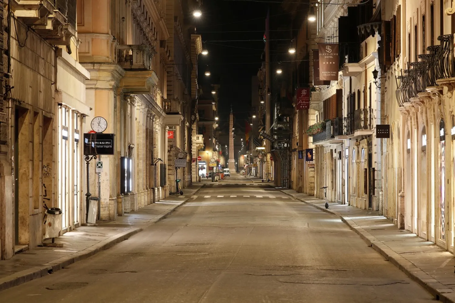 An empty Via del Corso is seen following the imposition of a curfew, as part of tougher measures to tackle the spread of the coronavirus, in Rome, Nov. 7, 2020. (Reuters)