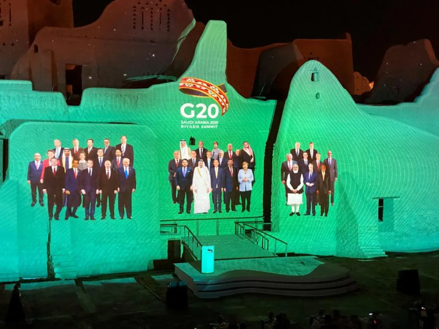 FILE PHOTO: Projection of a "Family Photo" for the annual G20 Leaders' Summit onto Salwa Palace in At-Turaif, one of Saudi Arabia's UNESCO World Heritage sites, in Diriyah, Saudi Arabia, November 20, 2020. REUTERS/Nael Shyoukhi/File Photo