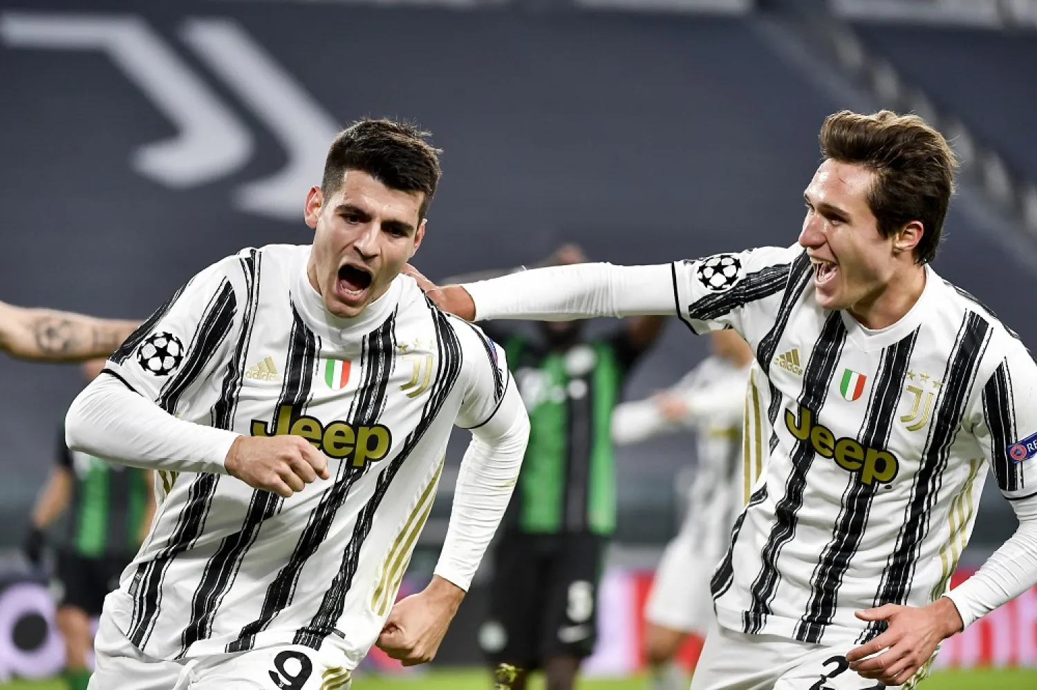 Juventus' Alvaro Morata celebrates a goal with teammate Federico Chiesa during the Champions league, match against Ferencvaros, at the Allianz Stadium in Turin, Italy, Nov. 24, 2020. (AP)