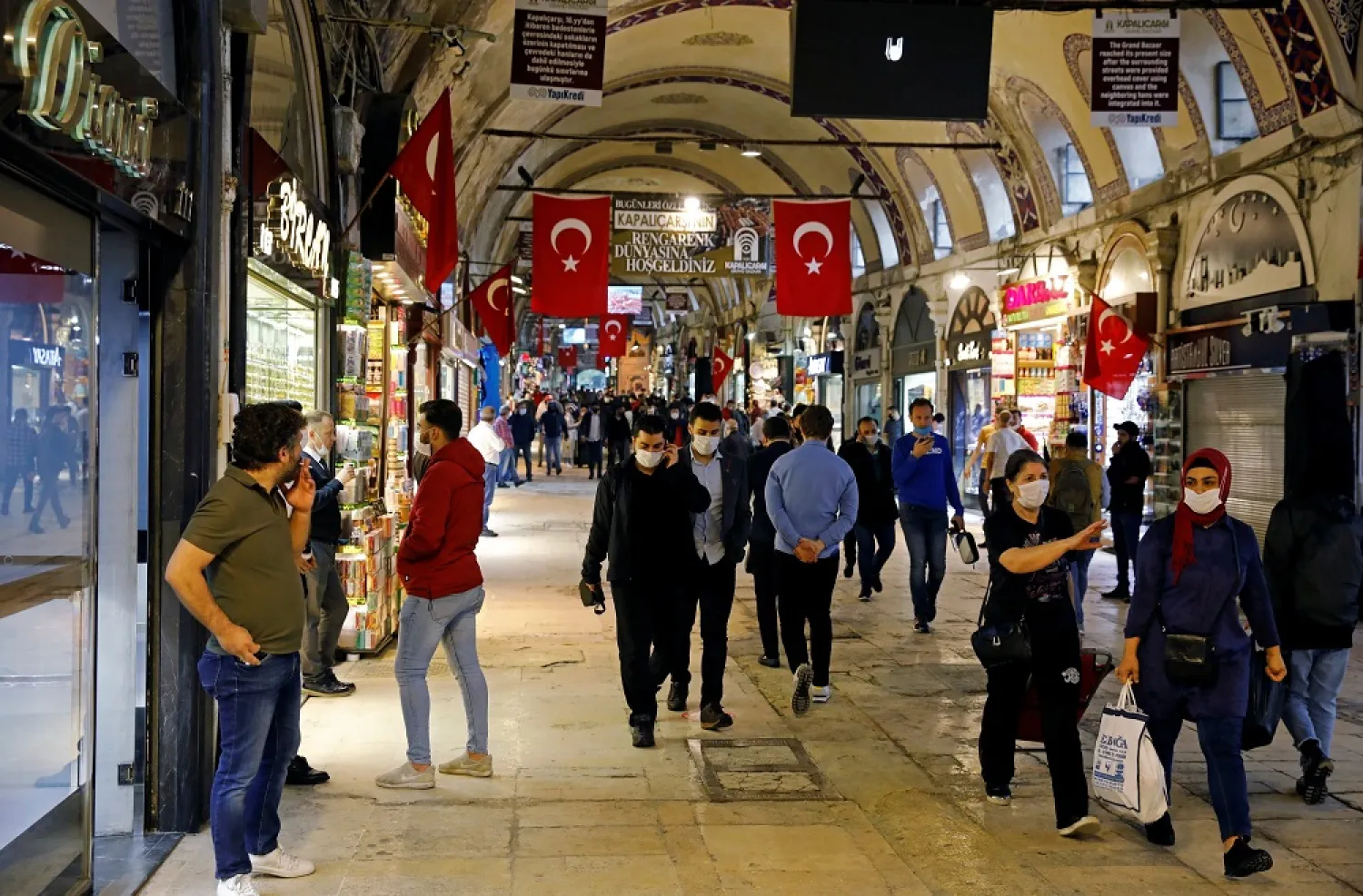 People wearing protective face masks walk in the Grand Bazaar in Istanbul, Turkey, June 1, 2020. (Reuters)