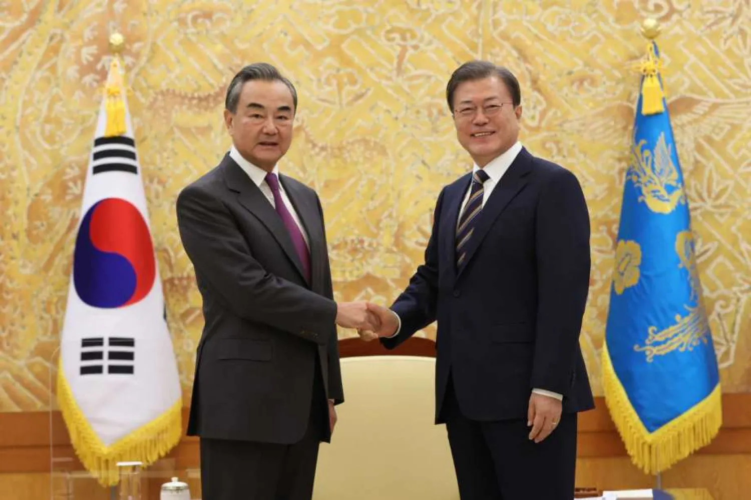 South Korean President Moon Jae-in, right, poses with Chinese Foreign Minister Wang Yi for a photo before a meeting at the presidential Blue House in Seoul, South Korea, Thursday, Nov. 26, 2020. (Kim Ju-sung/Yonhap via AP) less
