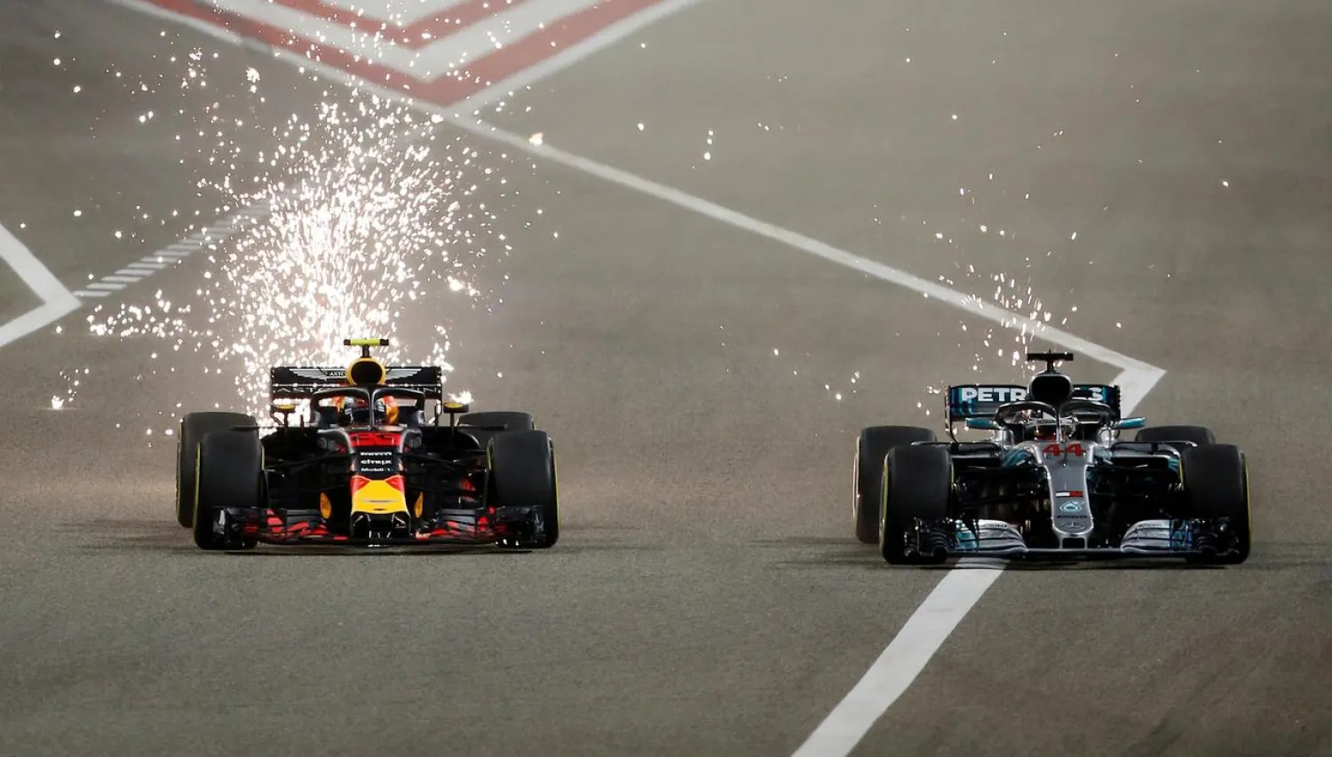 Formula 1 F1 - Bahrain Grand Prix - Bahrain International Circuit, Sakhir, Bahrain - April 8, 2018 Mercedes' Lewis Hamilton and Red Bull's Max Verstappen in action during the race REUTERS/Hamad I Mohammed