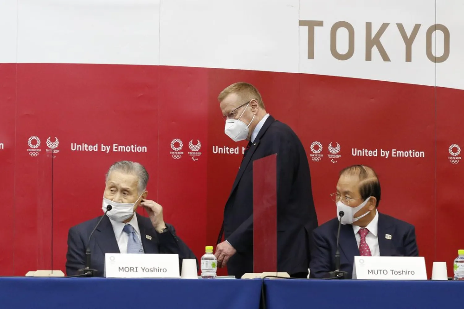 Left to right; Yoshiro Mori President of Tokyo 2020, John Coates Chairman of the Coordination Commission for the Games of the XXXII Olympiad Tokyo 2020 and Toshiro Muto CEO of Tokyo 2020, attend a joint press conference in Tokyo, Wednesday, Nov. 18, 2020. (Rodrigo Reyes Marin/Pool Photo via AP)
