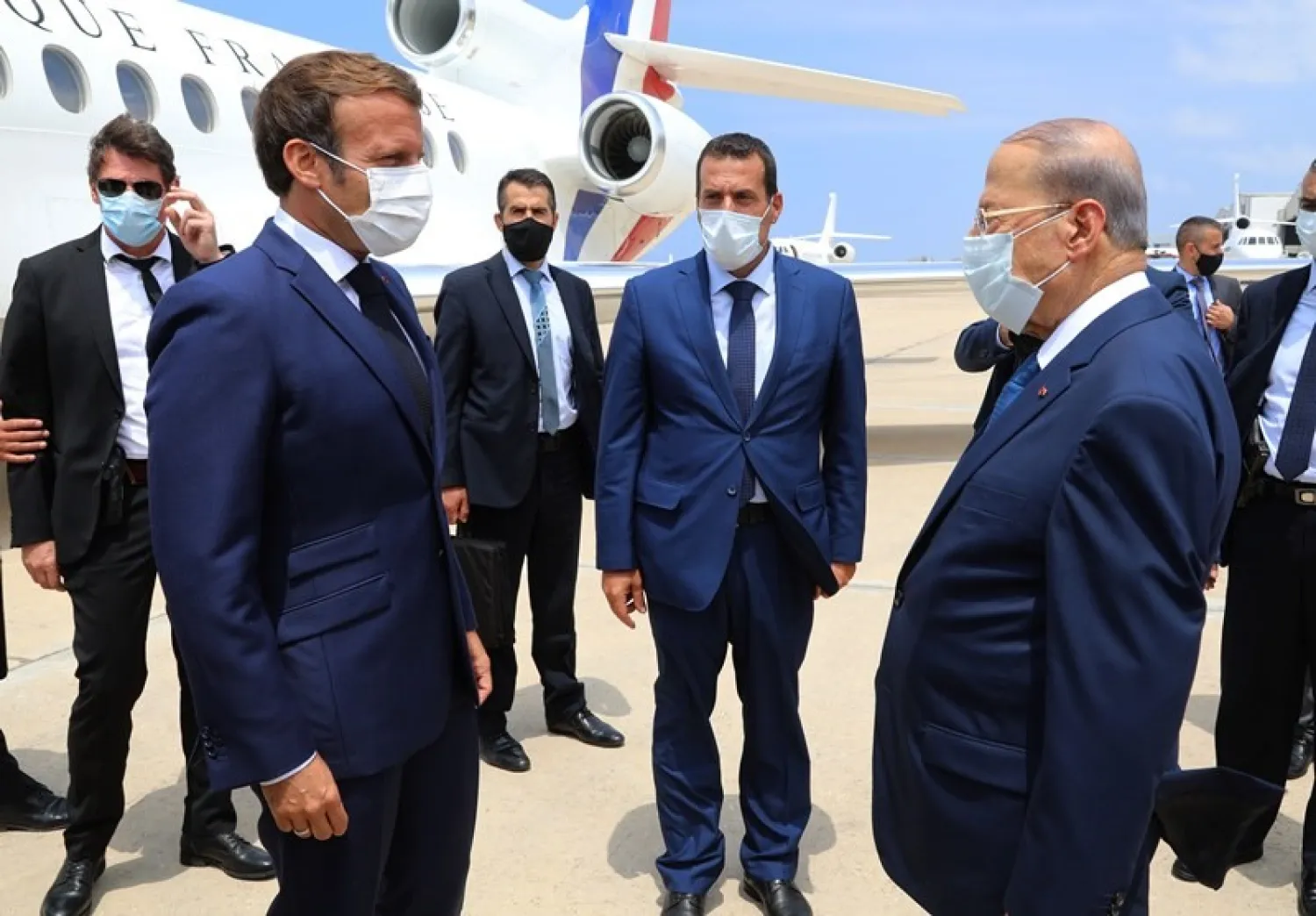 French President Emmanuel Macron received by Lebanese counterpart Michel Aoun following his arrival to Beirut last August. NNA