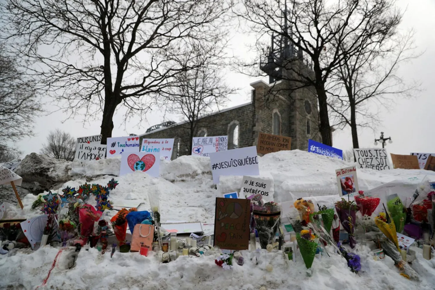 Memorial near site of fatal shooting at Quebec Islamic Cultural Center. Reuters file photo