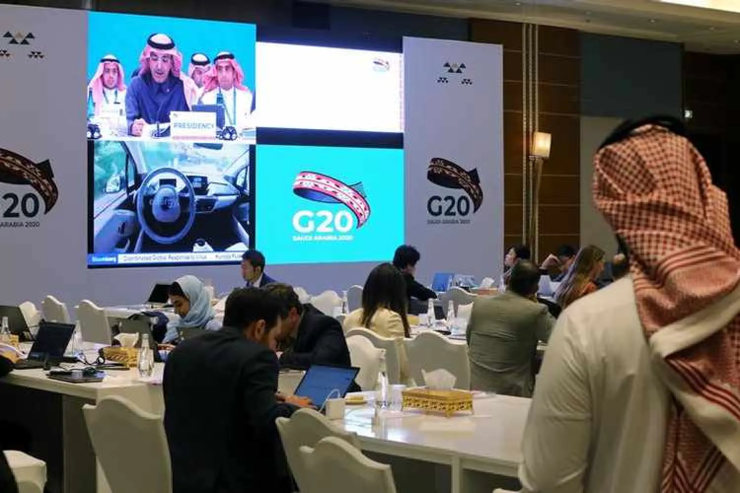 Journalists sit in the media center during a G20 meeting in Riyadh, Saudi Arabia, February 22, 2020. REUTERS/Ahmed Yosri

 