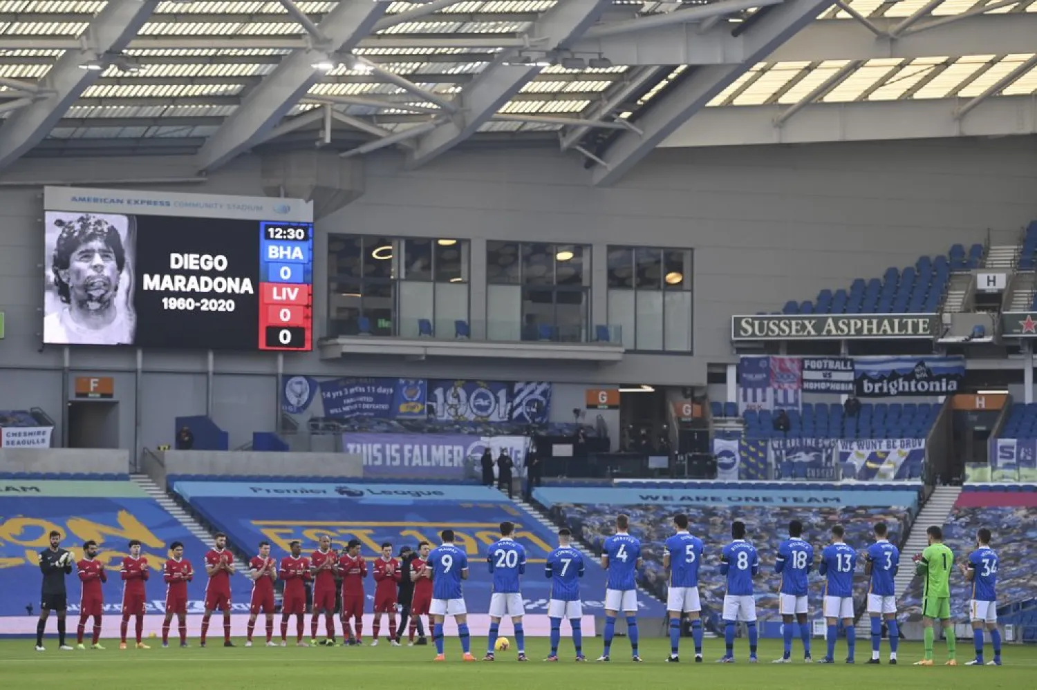 Birghton and Liverpool players pay their respect to football legend Diego Maradona prior to the start of their Premier League match at the Amex stadium in Brighton, England, Nov. 28, 2020. (AP)