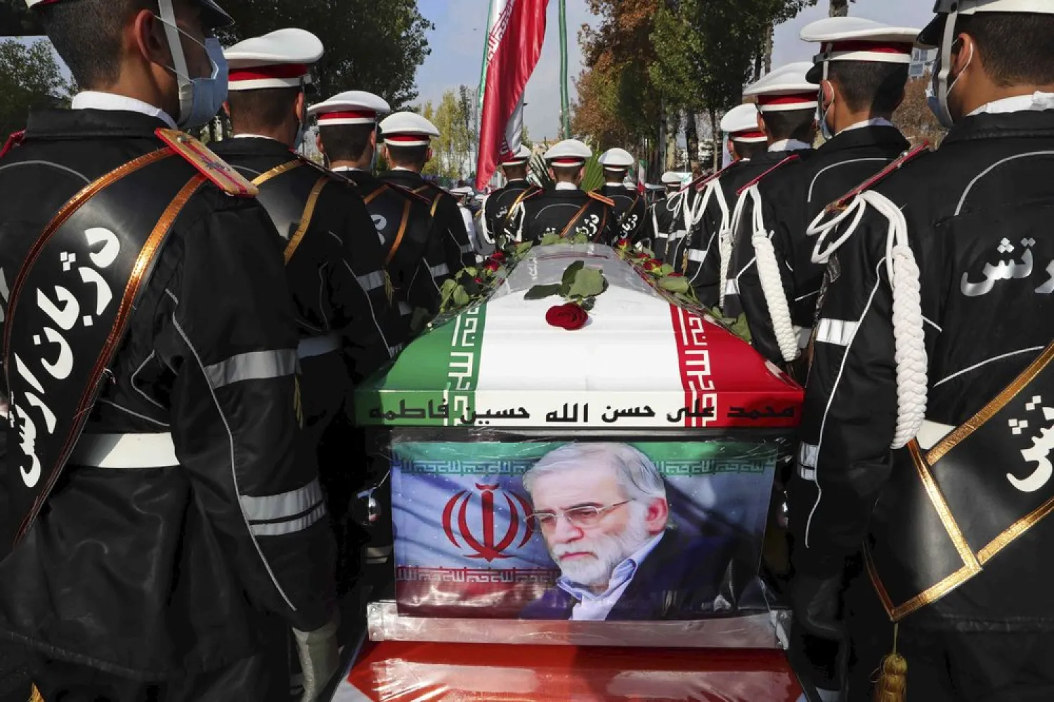 In this photo released by the official website of the Iranian Defense Ministry, military personnel stand near the coffin of Mohsen Fakhrizadeh during a funeral in Tehran, Iran, Nov. 30, 2020. (AP)