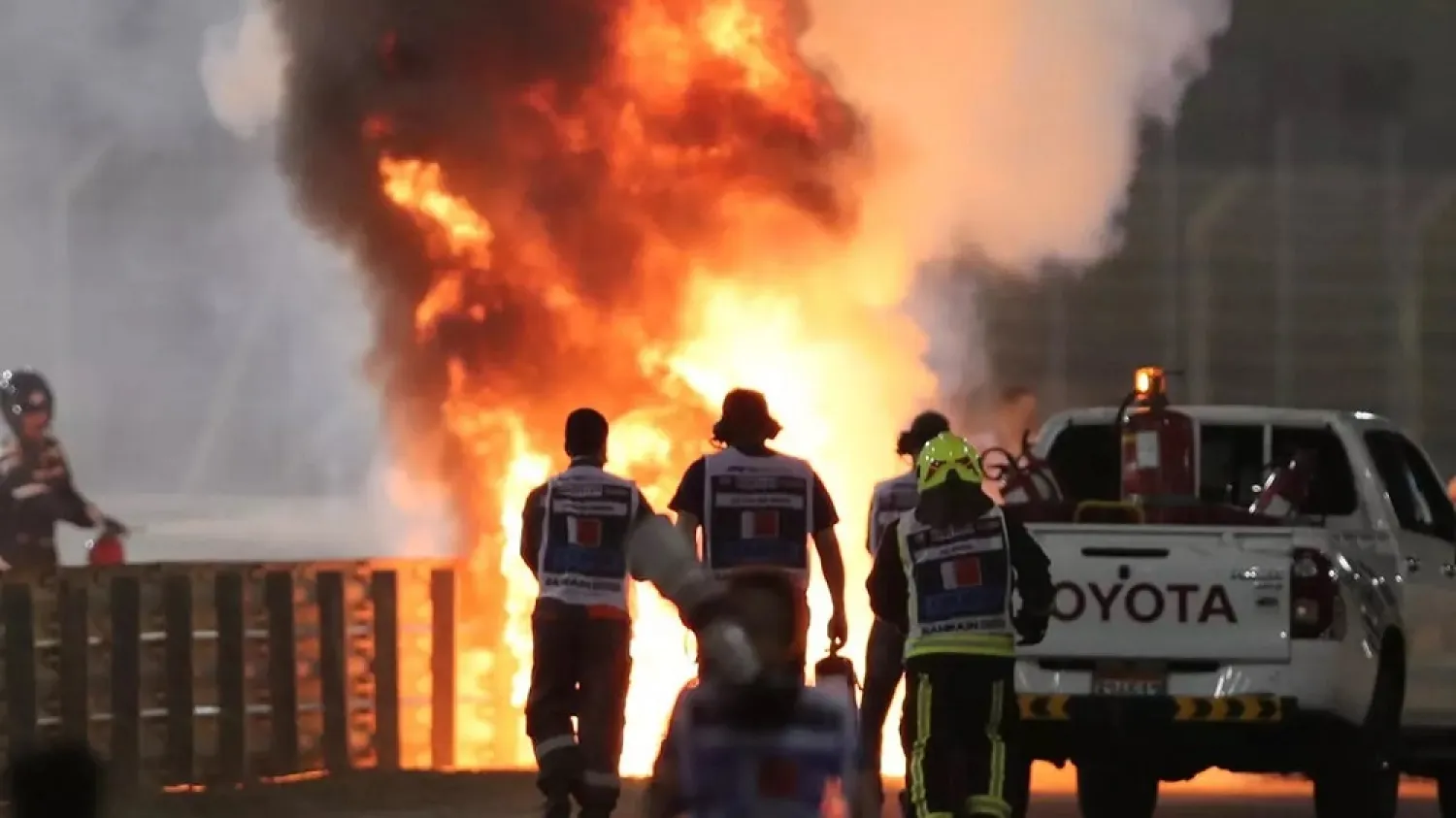 Flames seen from the crash scene after Haas' Romain Grosjean crashed out at the start of the Bahrain Grand Prix on November 29, 2020. (Reuters)