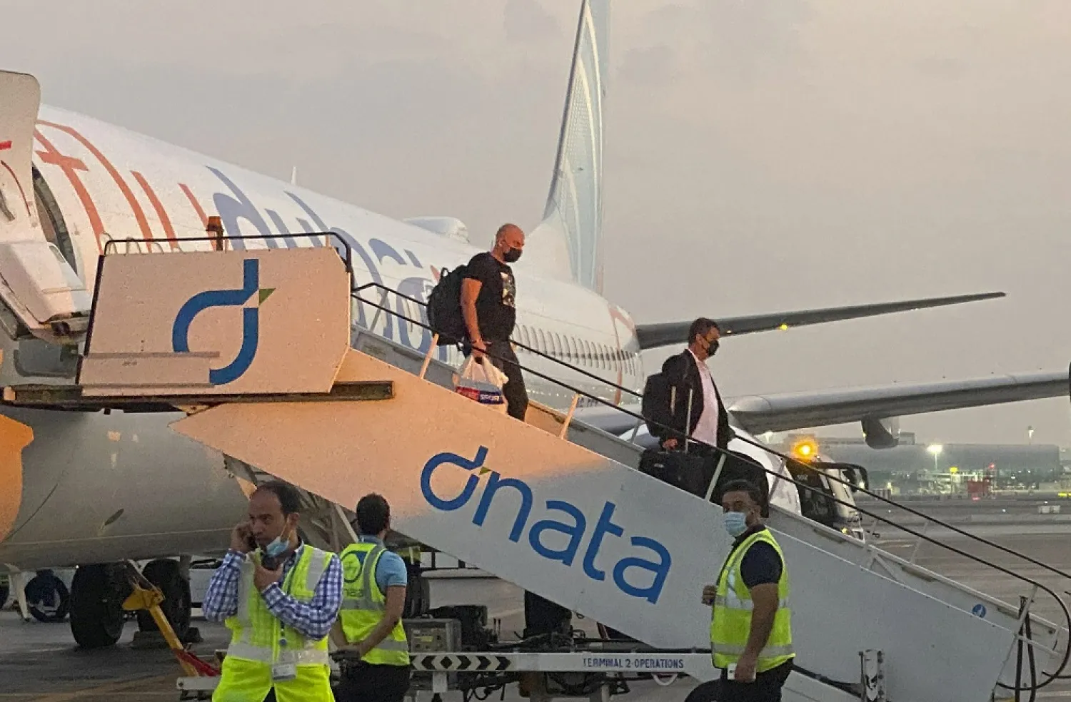 Israeli tourists deplane from a FlyDubai flight from Tel Aviv to Dubai, on Nov. 28. (AP)