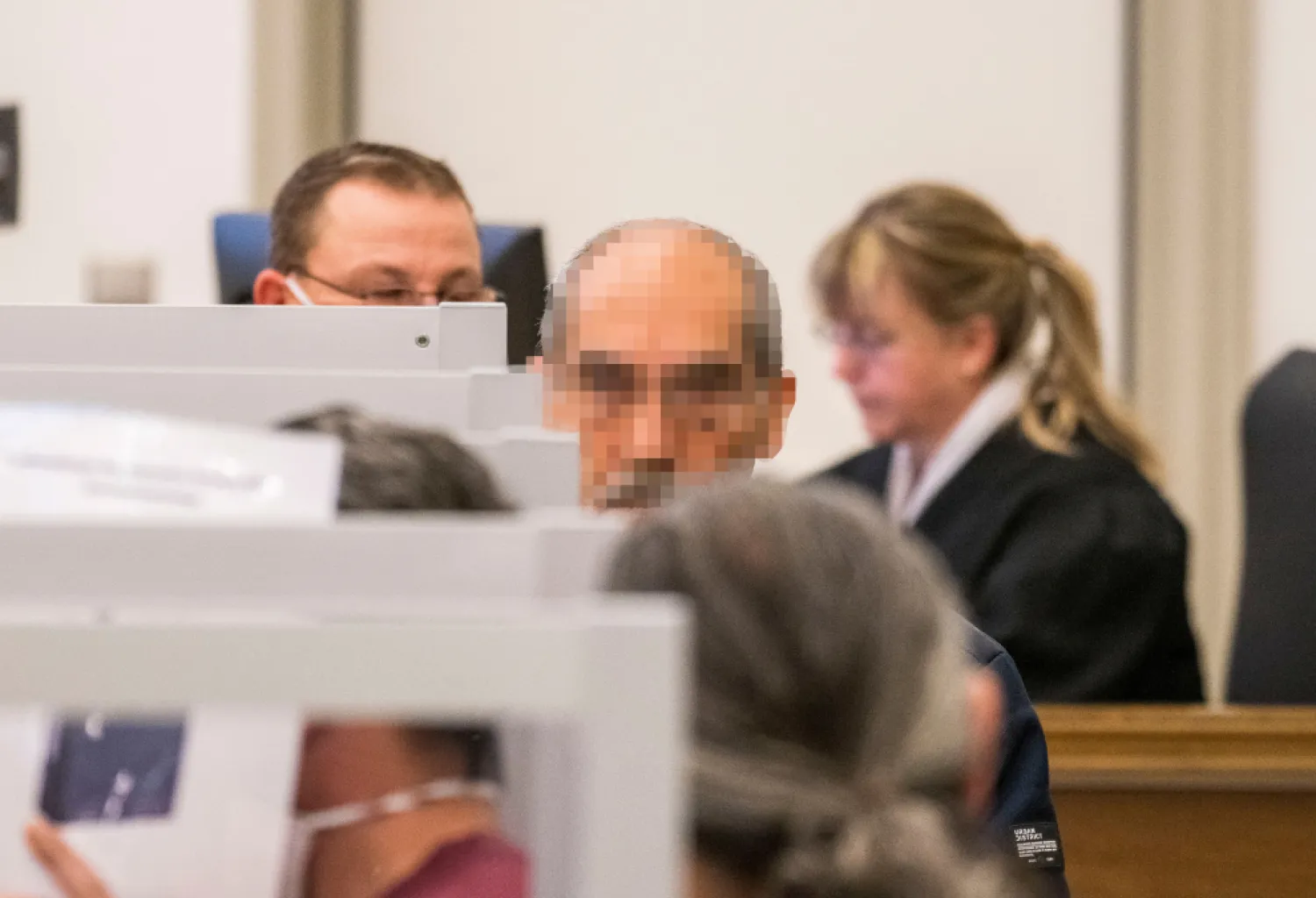 Syrian defendant Anwar R. (2nd R), accused of crimes against humanity, in the first trial of its kind to emerge from the Syrian conflict, arrives at court, in Koblenz, Germany June 4, 2020. (Reuters) 