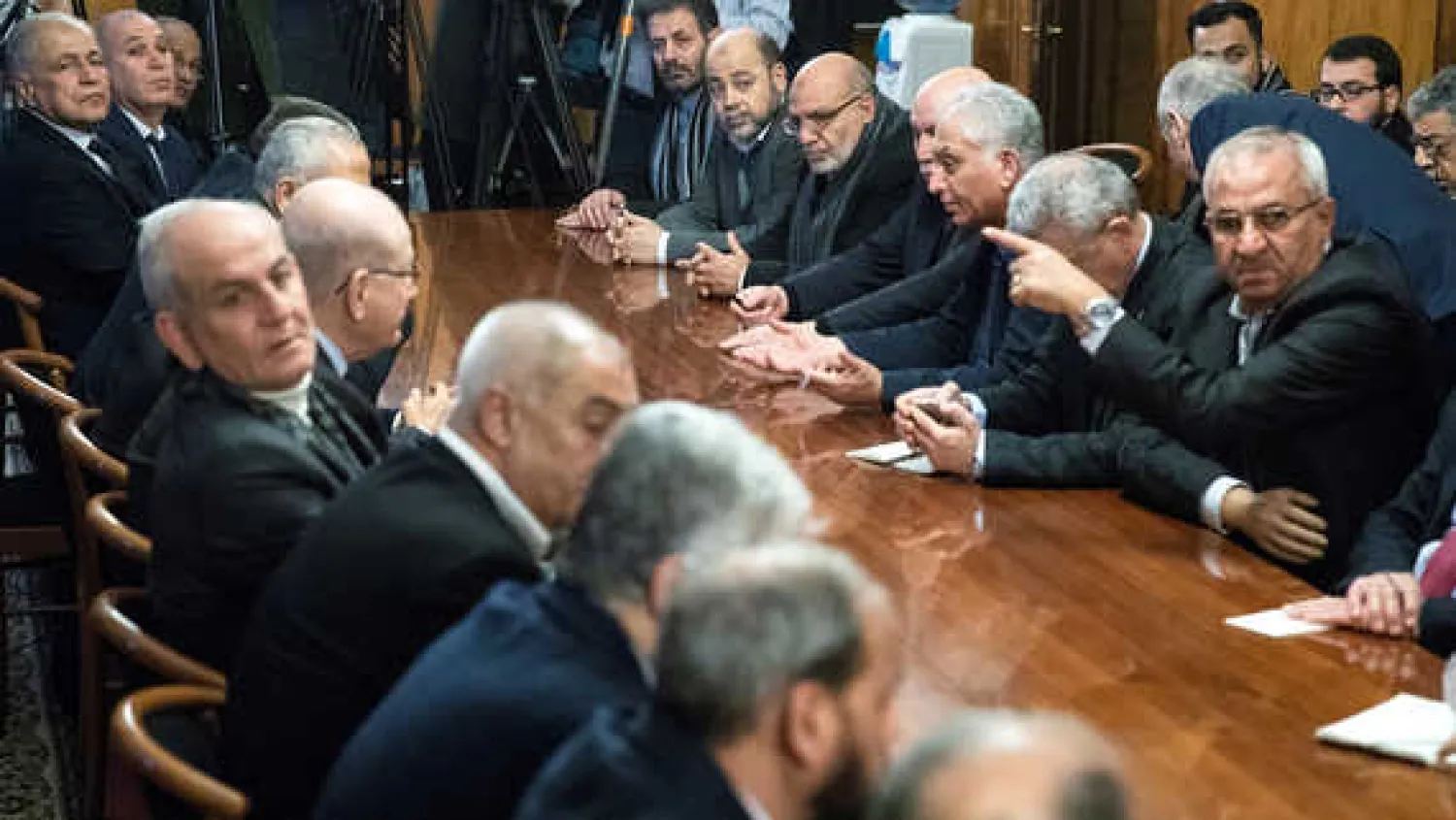Fatah and Hamas officials wait for a meeting with Russian Foreign Minister Sergey Lavrov and representatives of Palestinian groups and movements as a part of an intra-Palestinian talks, Moscow, Russia, Feb. 12, 2019. Photo by Pavel Golovkin/Pool via REUTERS.
