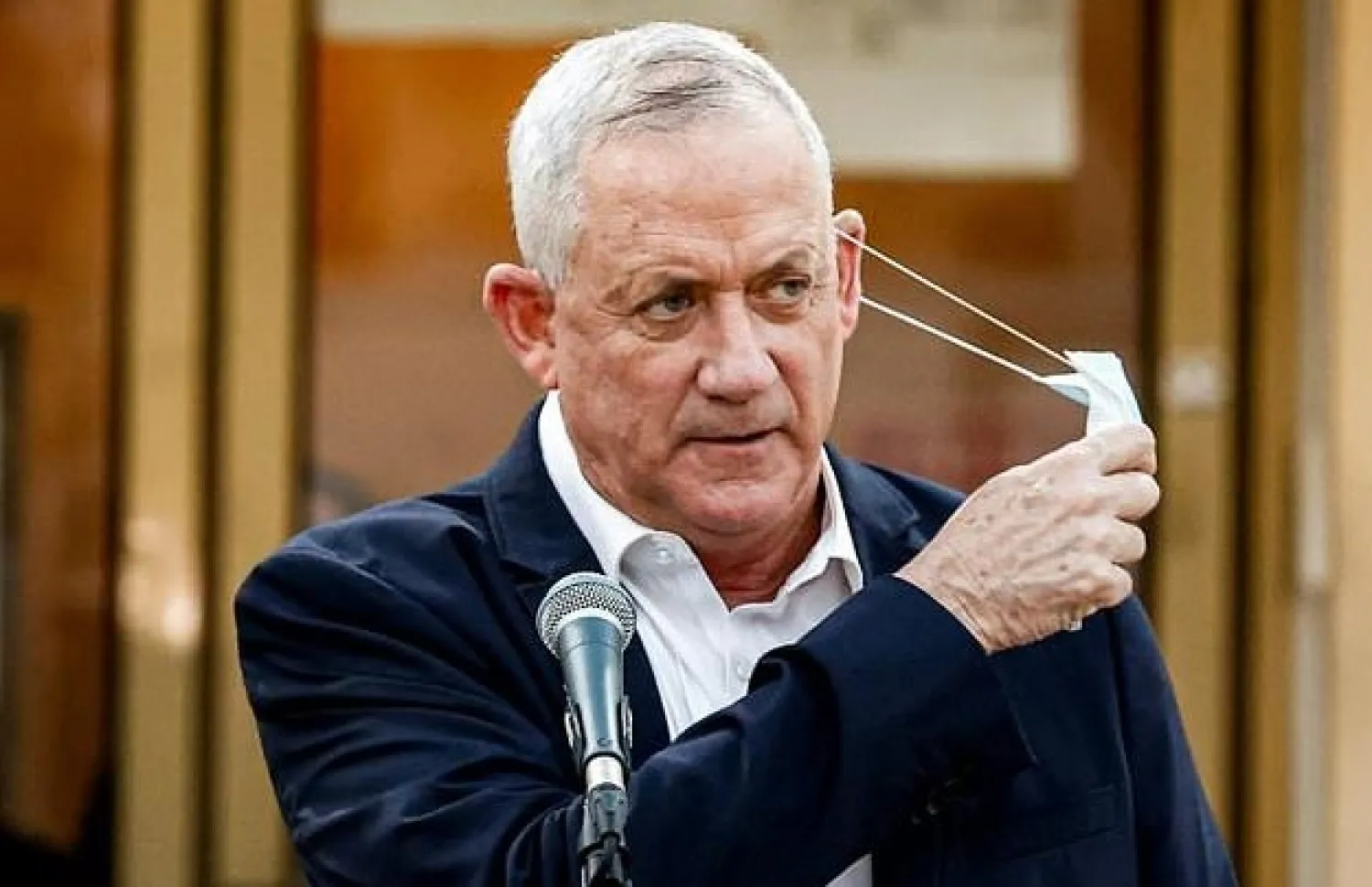 Israel's Alternate Prime Minister and Defense Minister Benny Gantz has accused Prime Minister Benjamin Netanyahu of being a "serial promise-breaker" - AFP