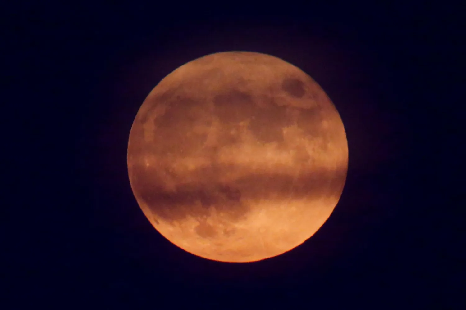 FILE PHOTO: The full moon, known as the "Buck Moon", is seen from West Orange, in New Jersey, US July 16, 2019. REUTERS/Eduardo Munoz