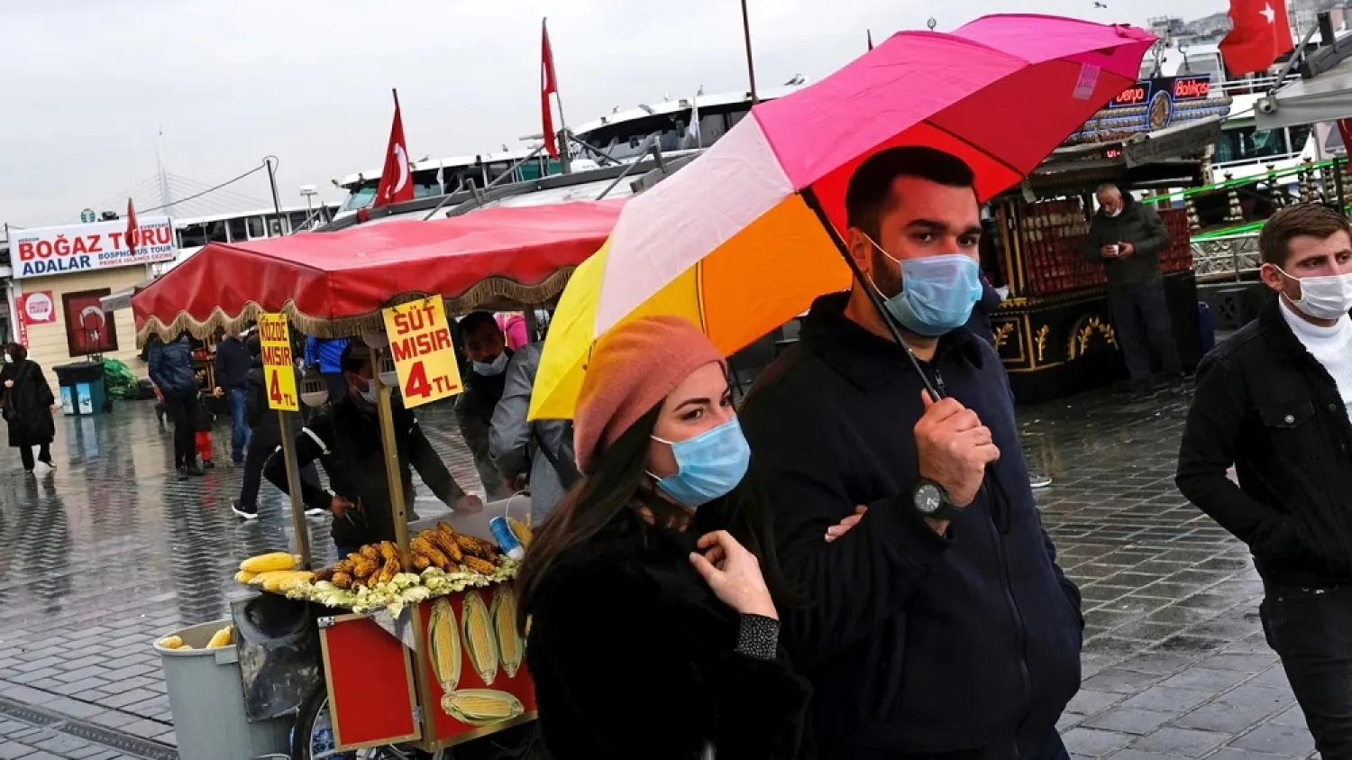 People wearing protective masks stroll in Eminonu district, amid the spread of coronavirus disease (COVID-19), in Istanbul, Turkey November 7, 2020. (Reuters)