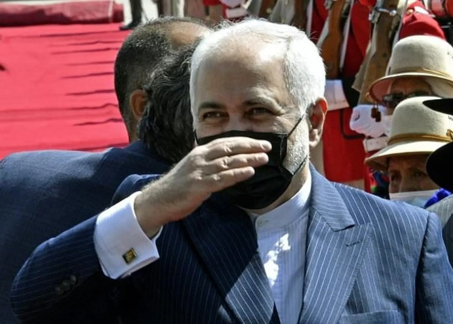 Iran's Foreign Minister Mohammad Javad Zarif, seen on a November 2020 visit to Bolivia, has urged President-elect Joe Biden to end US "rogue" behavior. AFP