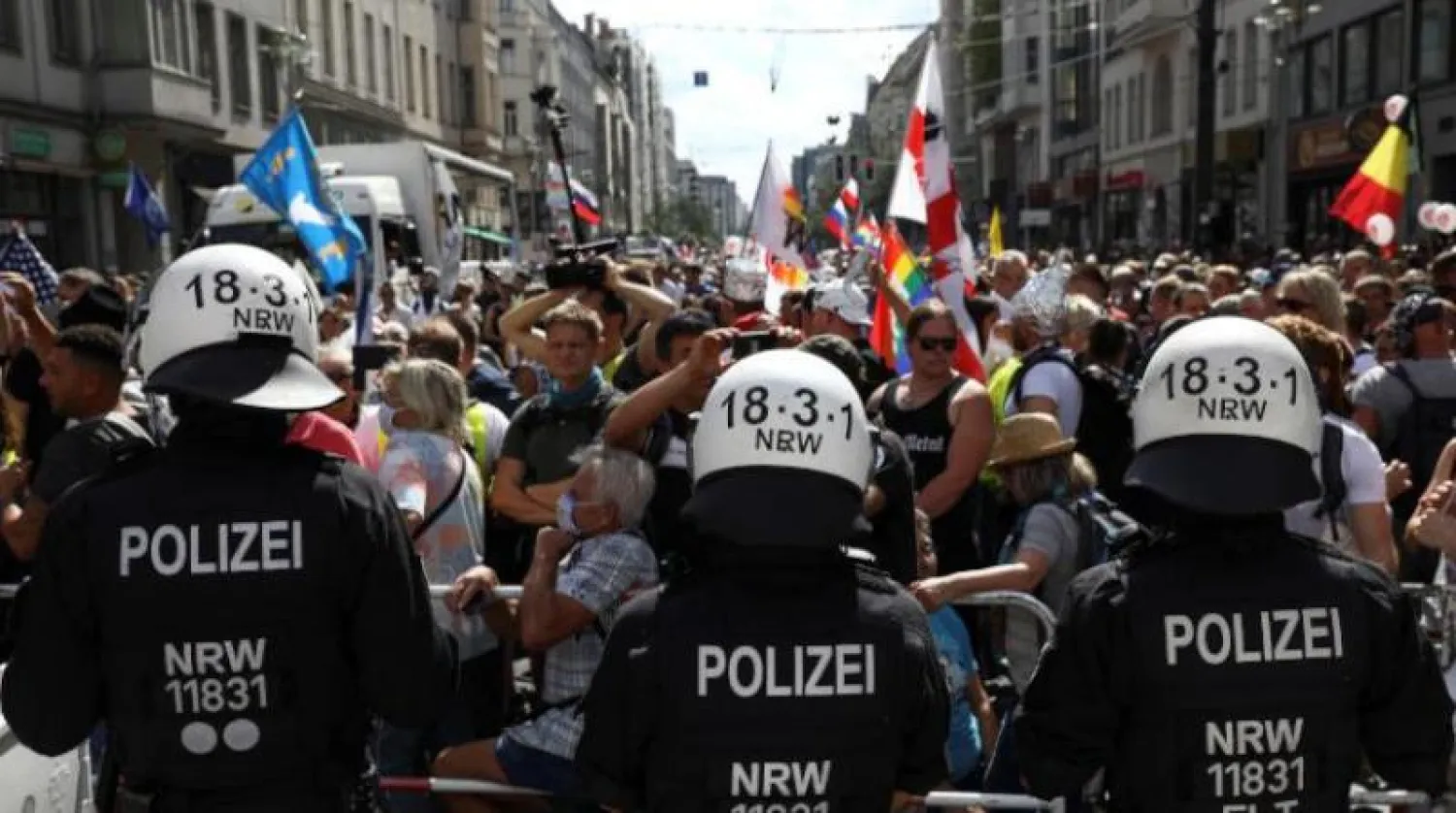 مظاهرة في برلين احتجاجاً على سياسة البلاد في احتواء جائحة فيروس «كورونا» (رويترز)