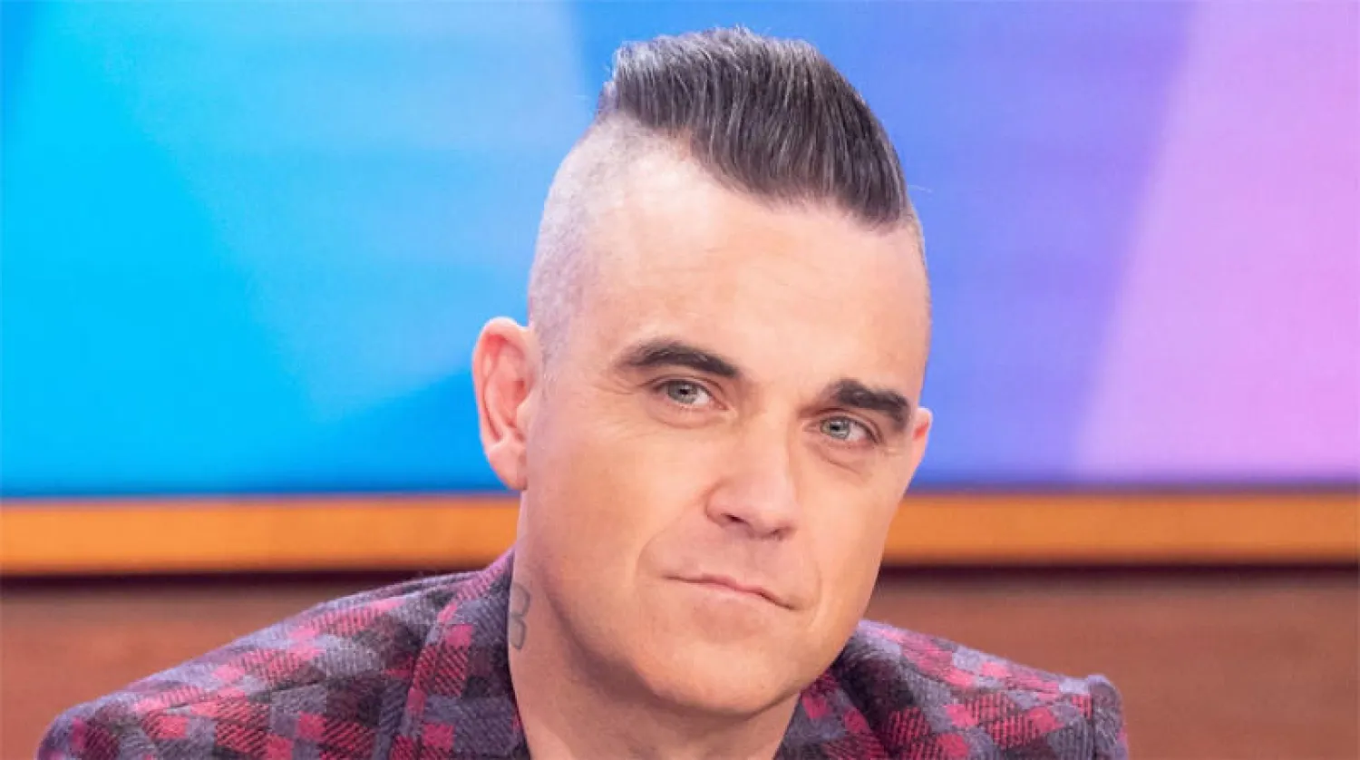 روبي ويليامز يخطط لإطلاق فرقة موسيقية وملهى ليلي