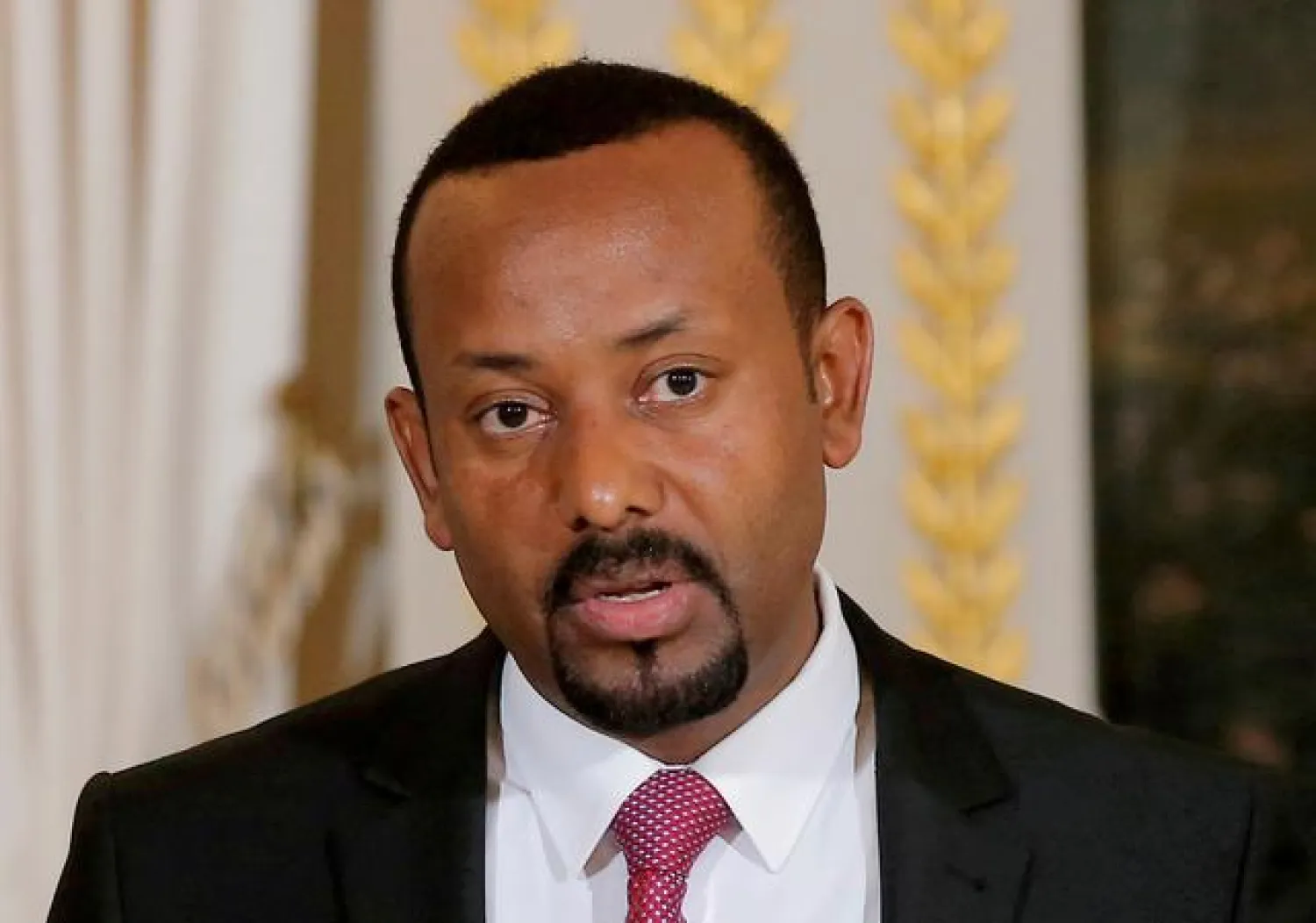 FILE PHOTO: Ethiopian Prime Minister Abiy Ahmed speaks during a media conference at the Elysee Palace in Paris, France, October 29, 2018. Michel Euler/Pool via REUTERS
