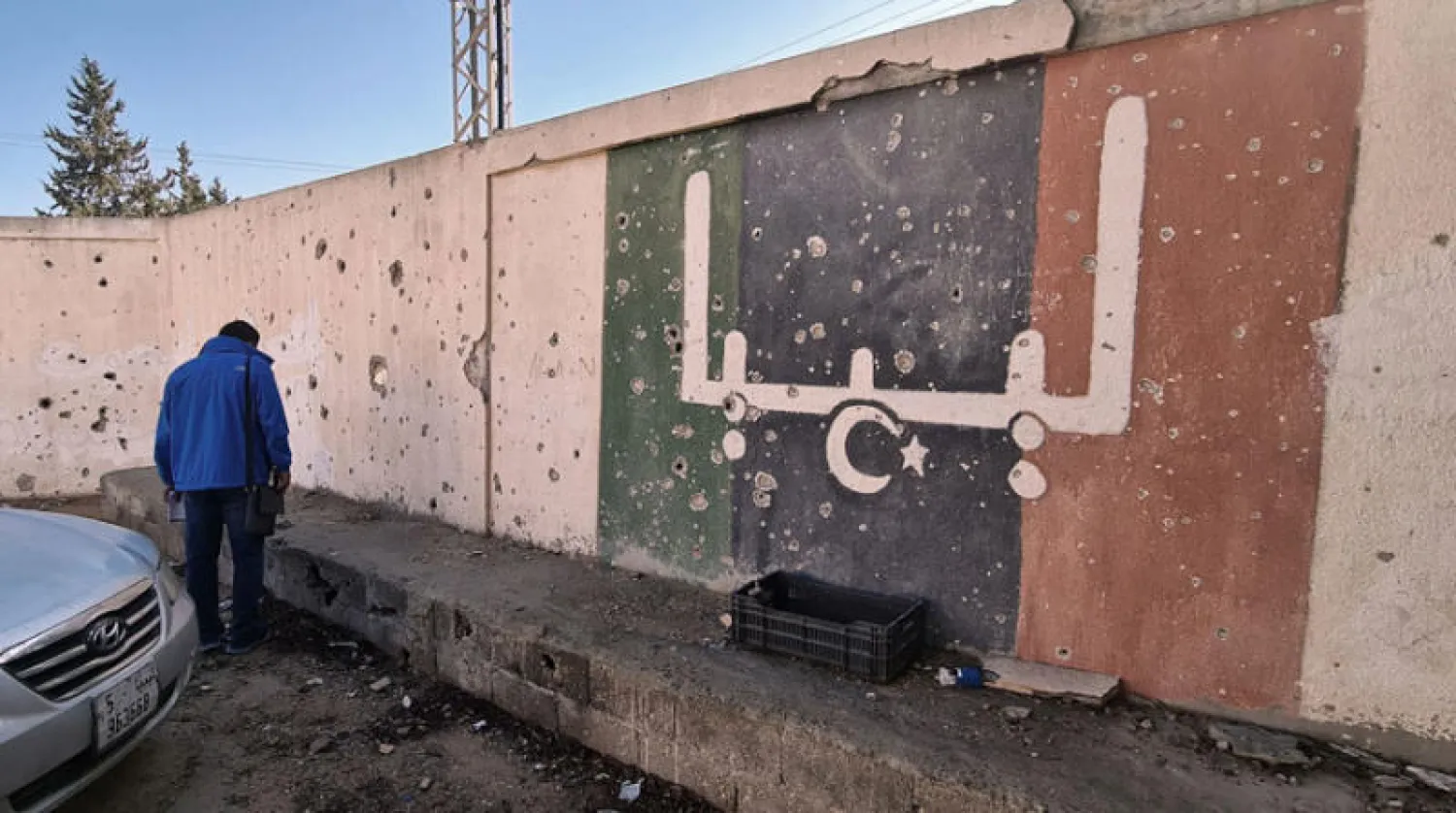 مدرسة تضررت بفعل المواجهات التي شهدتها منطقة عين زارة قرب طرابلس في وقت سابق هذه السنة (أ.ف.ب)