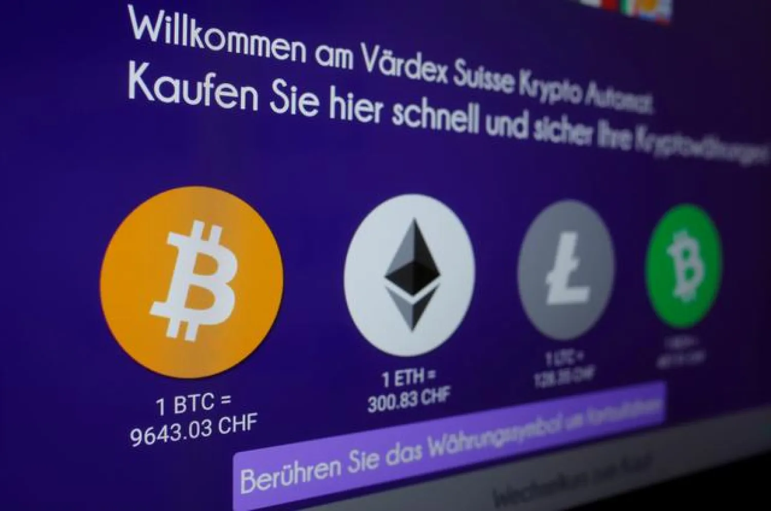 The exchange rates and logos of Bitcoin (BTH), Ether (ETH), Litecoin (LTC) and Bitcoin Cash (BCH) are seen on the display of a cryptocurrency ATM of blockchain payment service provider Vaerdex at the headquarters of Swiss Falcon Private Bank in Zurich, Switzerland May 29, 2019. REUTERS/Arnd Wiegmann/File Photo