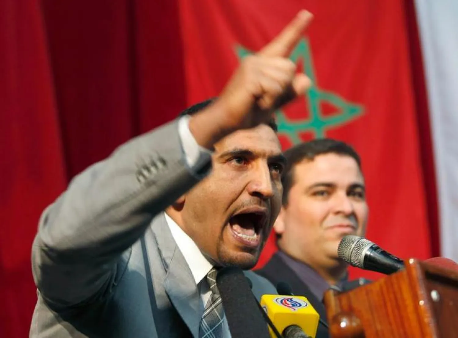 Karim Tabbou (left). Photo: REUTERS / Louafi Larbi