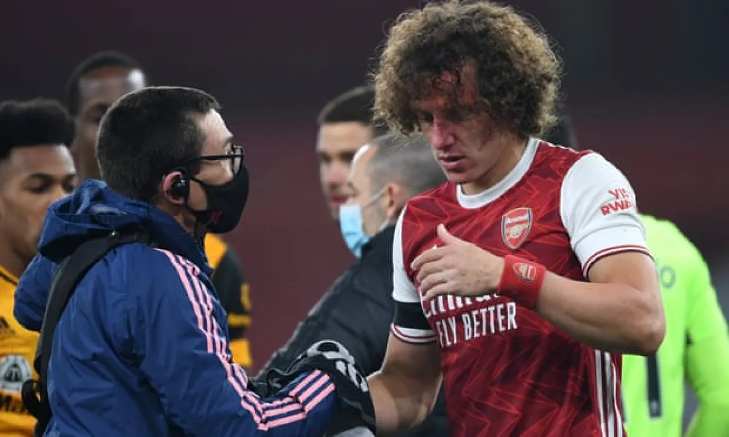 Arsenal’s David Luiz is treated after Sunday’s sickening clash of heads with Wolves’ Raúl Jiménez, who has now been diagnosed with a fractured skull. Photograph: David Price/Arsenal FC/Getty Images