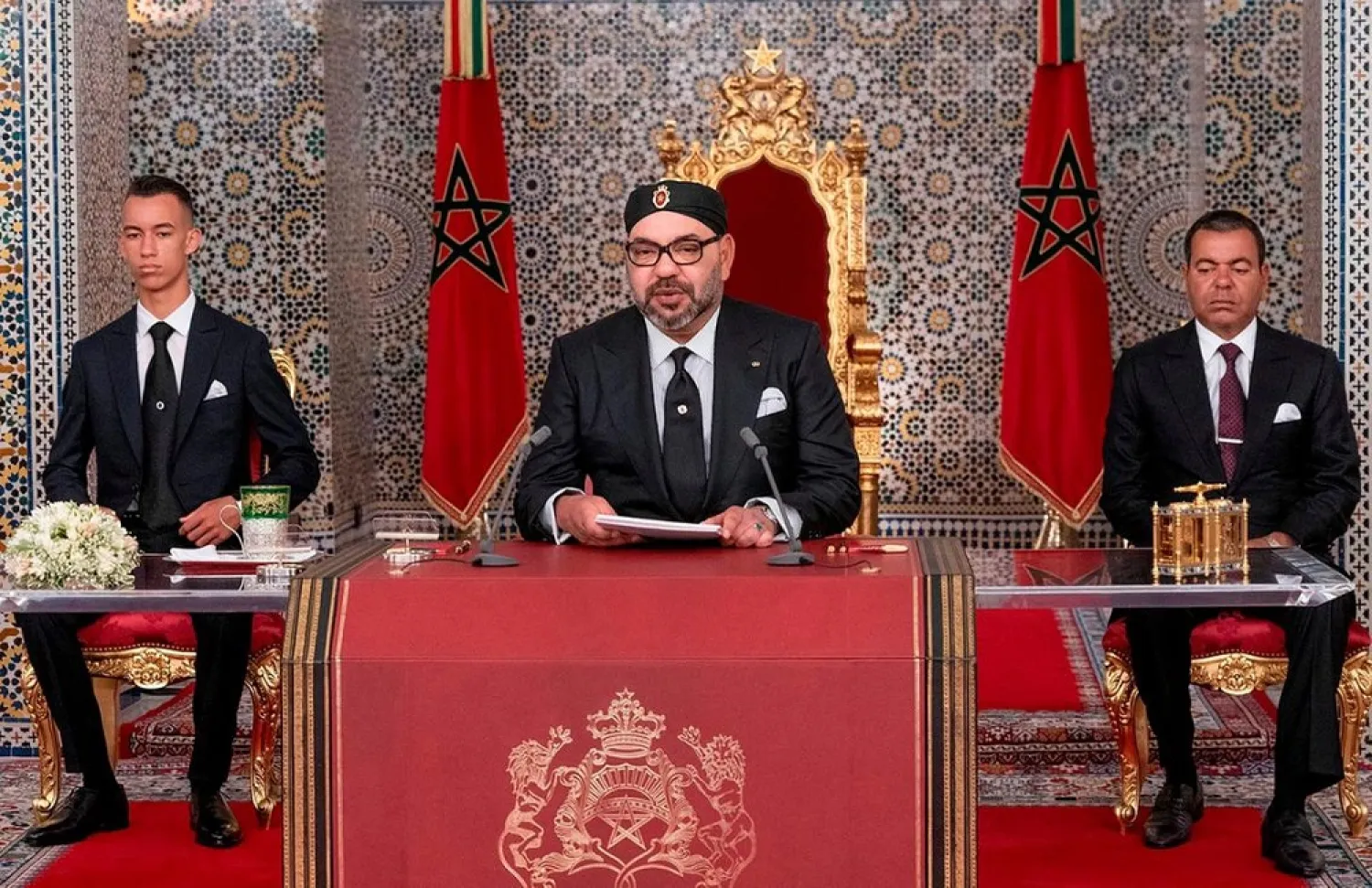 Morocco's King Mohammed VI (C) delivers a speech marking the 20th anniversary of his accession to the throne. (AFP)